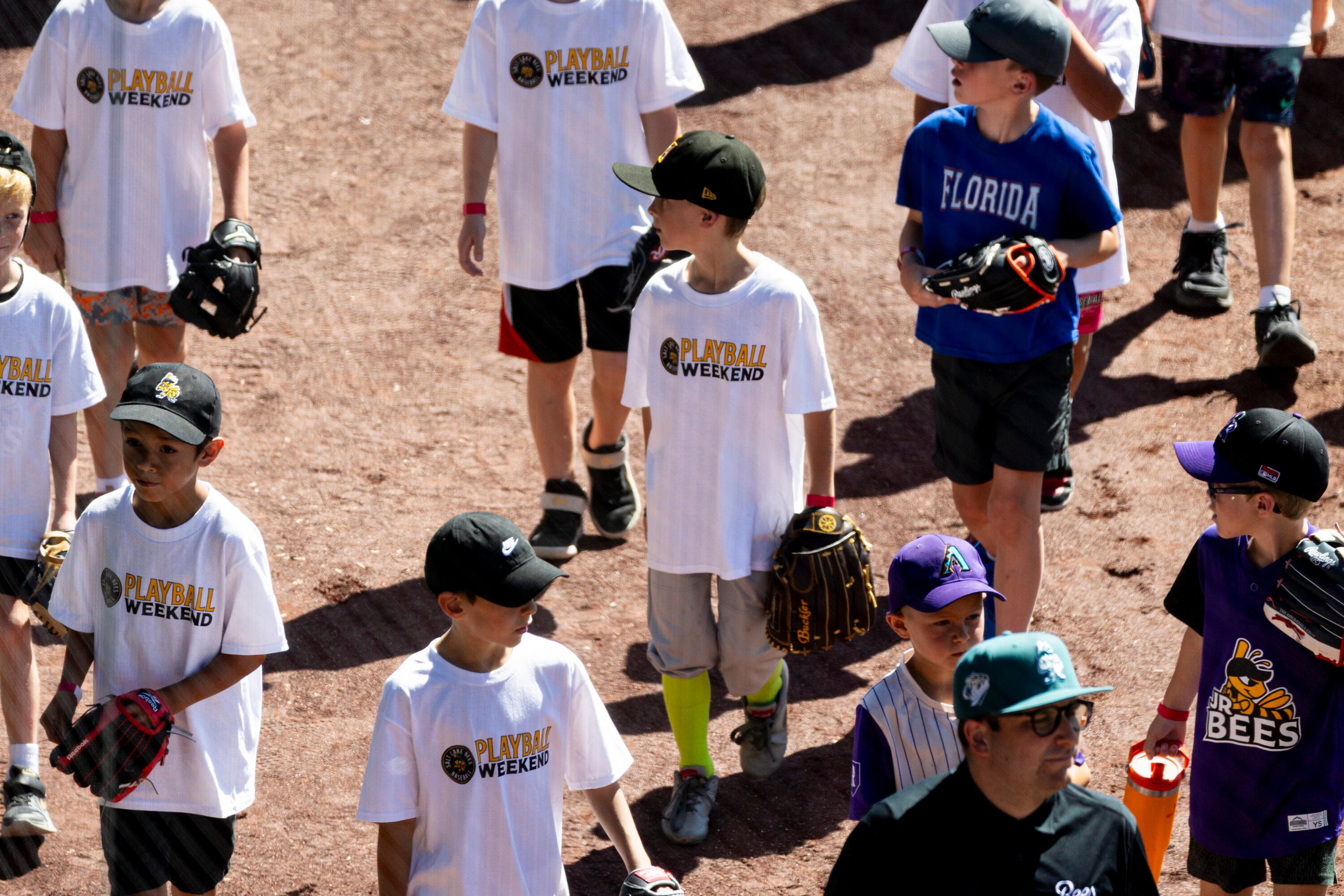 Youth participants walk to a different station as part of activities during a kick-off event for Utah Youth Sports Giving Day held at The Ballpark at America First Square in South Jordan on Friday. The event looks to increase access for youth sports in the state.