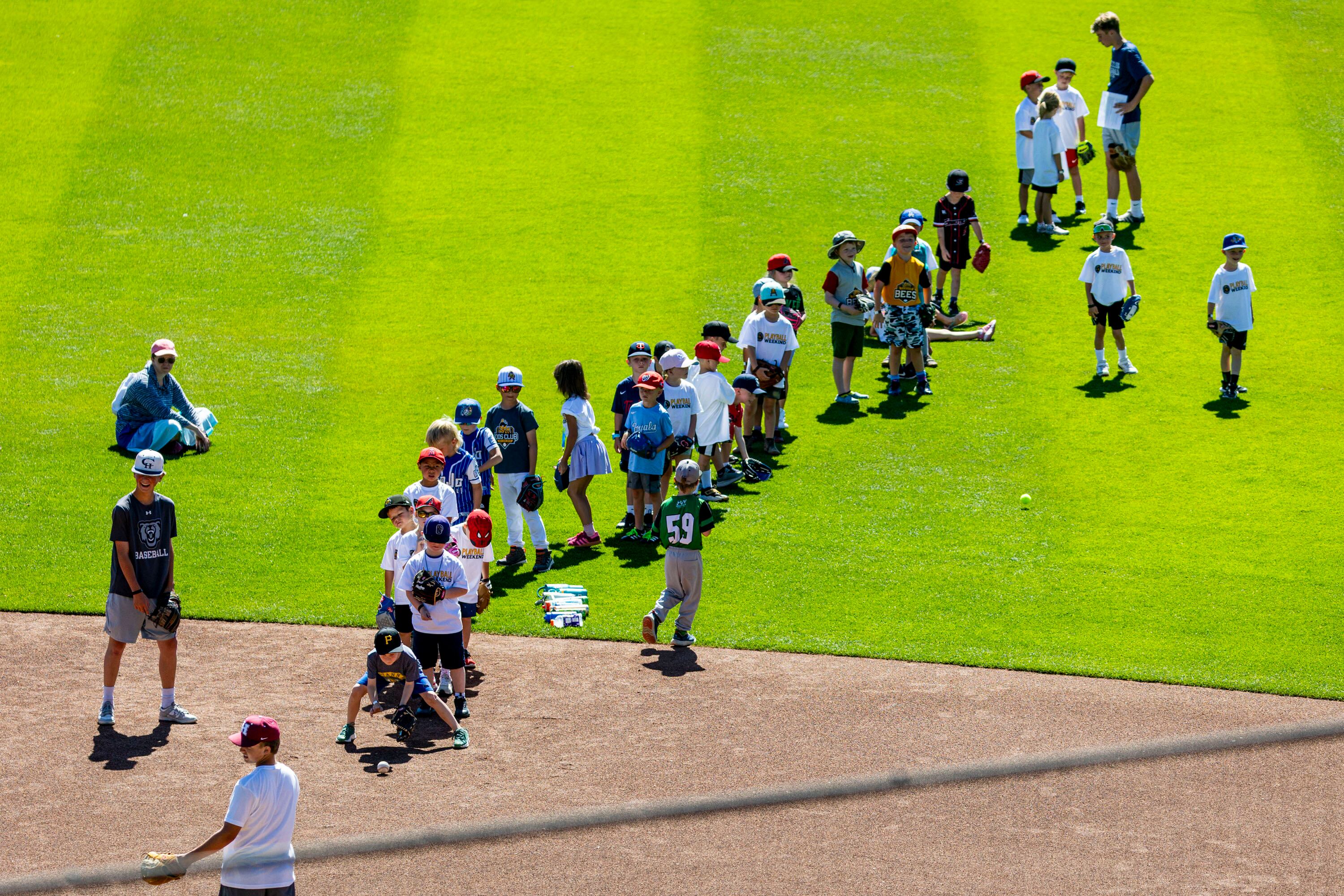 Youth participants practice fielding ground balls as part of a kick-off event for Utah Youth Sports Giving Day held at The Ballpark at America First Square in South Jordan on Friday. The event looks to increase access for youth sports in the state.