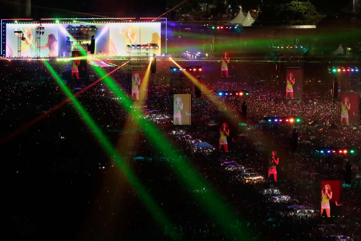 Fans pack the shores of Copacabana Beach to watch a free concert by Shakira in Rio de Janeiro, May 2. Concertgoers are embracing the use of earplugs to protect their hearing at concerts.