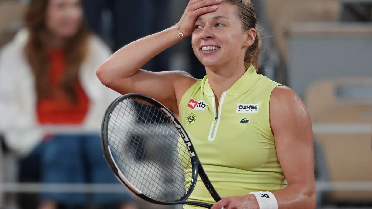 Poland's Maja Chwalinska react after winning during the semifinal tennis match against Russia's Diana Shnaider at the French Open in Paris, Thursday, June 4, 2026.