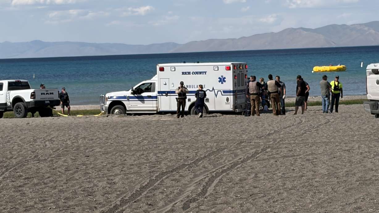 First responders at the site of a drowning at Bear Lake in Garden City, Rich County, on Saturday. A 17-year-old Arizona boy who was not wearing a life jacket was recovered from the lake after he fell off his paddleboard.