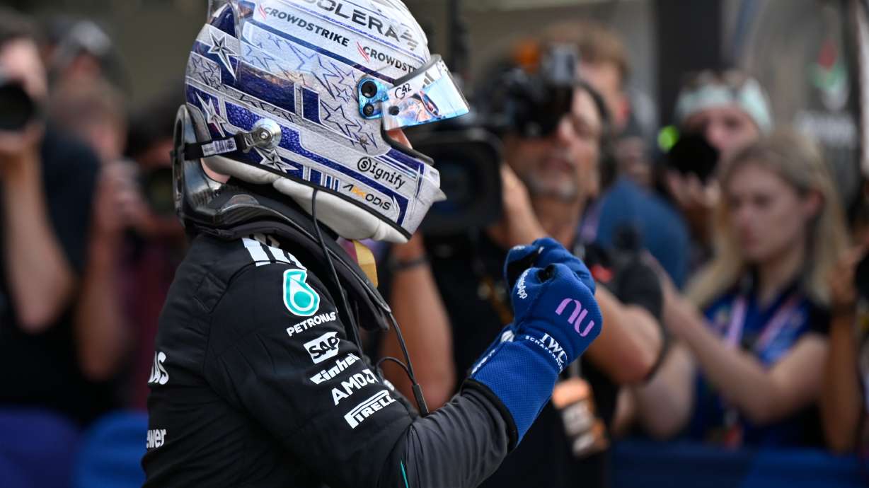 Mercedes driver Andrea Kimi Antonelli of Italy celebrates after setting the pole position during the qualifying session for the Monaco F1 Grand Prix, at the Monaco racetrack, Saturday, June 6, 2026.