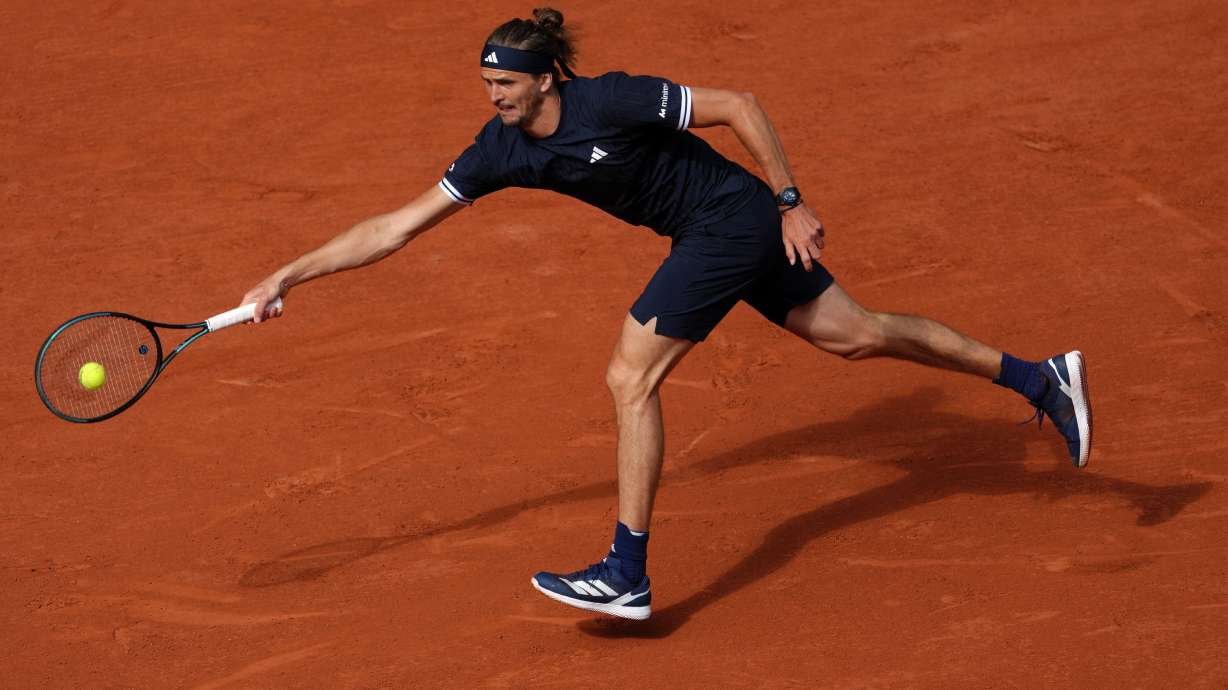 Germany's Alexander Zverev returns to Czech Republic's Jakub Mensik during the semifinal tennis match at the French Open in Paris, Friday, June 5, 2026.