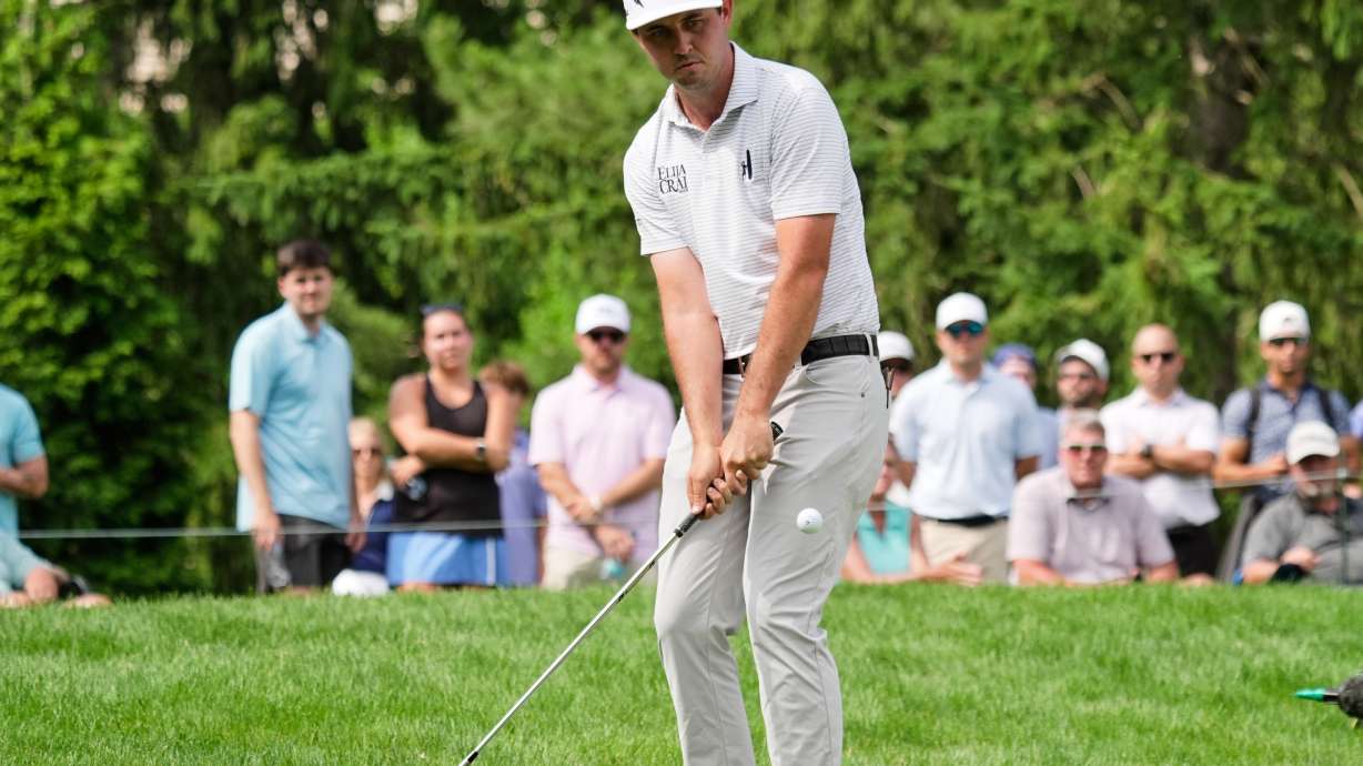 J.T. Poston chips onto the sixth green during the third round of the Memorial golf tournament, in Dublin, Ohio, Saturday, June 6, 2026.