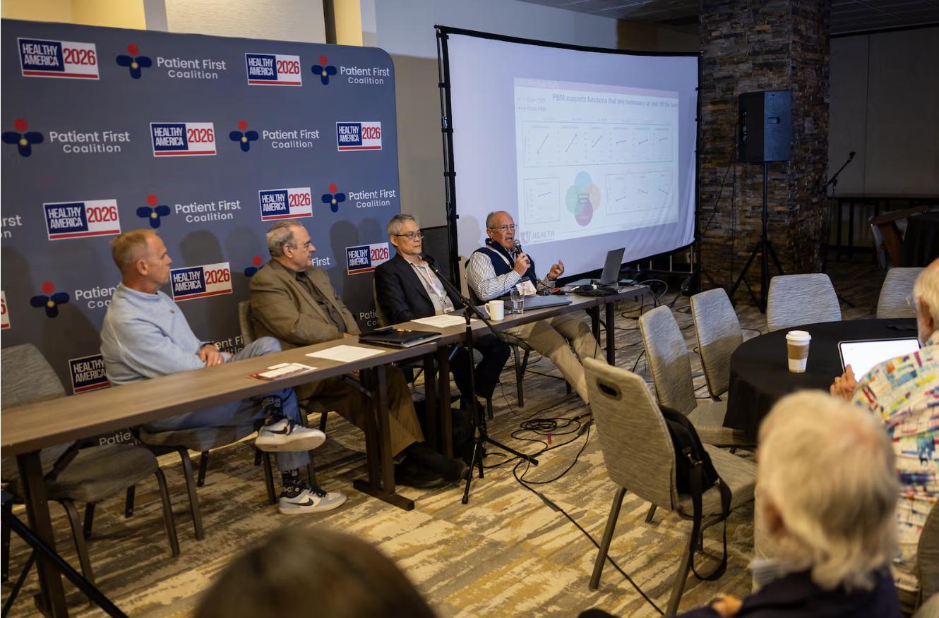From left, former BYU and San Francisco 49ers football player Tom Holmoe; Scot Faulkner, board member for the Photobiomodulation Foundation; Lew Lim, Vielight founder and CEO; and former BYU football player Larry Carr speak about red light therapy treatment for CTE during the “Healthy America 2026 — Going for the Summit” conference at the Westgate Park City Resort & Spa in Park City on May 5.