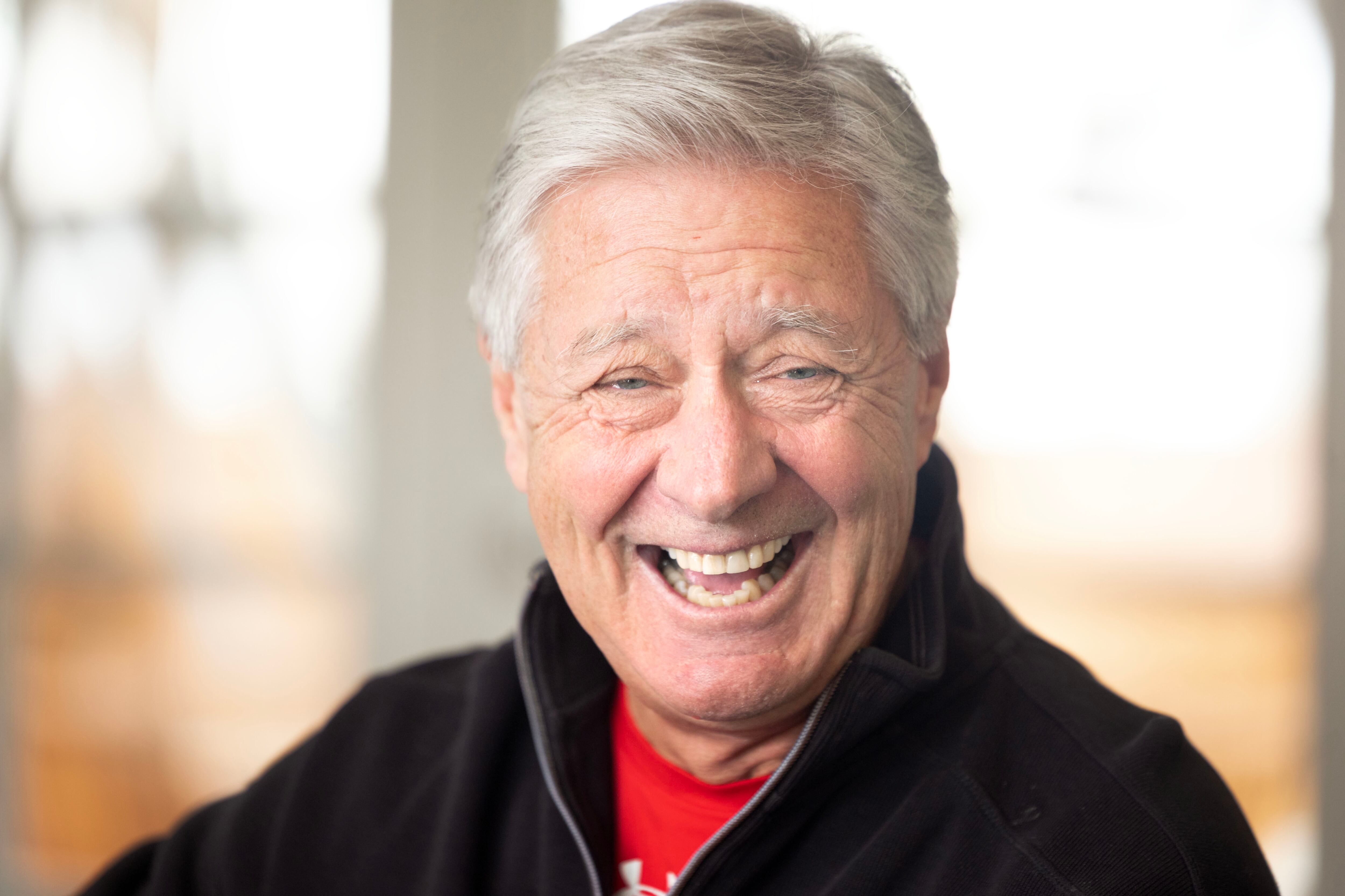 Chris Hill, athletic director at the University of Utah from 1987 to 2018, is pictured in his home in Salt Lake City on March 23. Hill released his memoir this week.