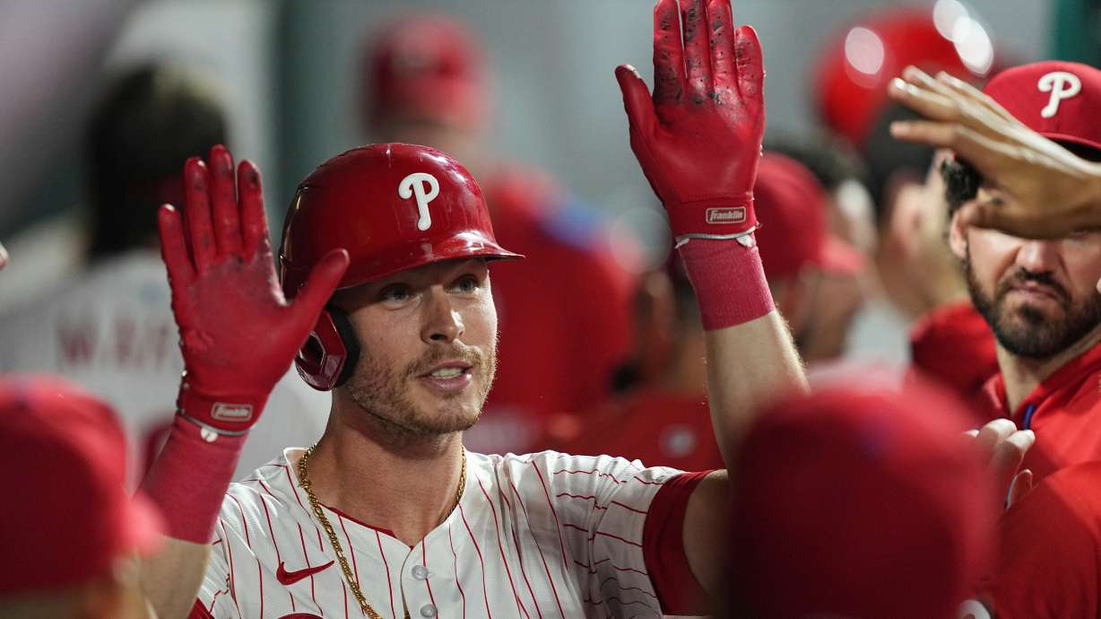 FILE - Philadelphia Phillies' Max Kepler celebrates after hitting a home run off of New York Mets pitcher Ryan Helsley during the eighth inning of a baseball game, on Sept. 10, 2025, in Philadelphia.