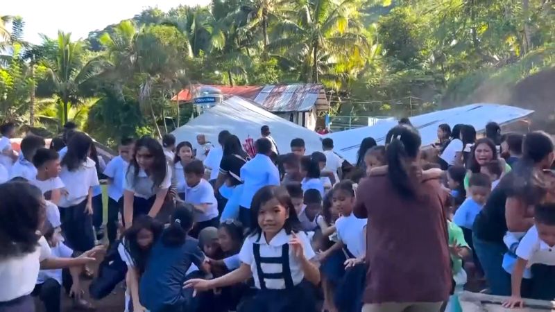 This image made from video provided by DepEd Mahayahay Elementary School shows school children reacting as a canopy roof, rear, collapsed, caused by a powerful earthquake Monday, June 8, 2026, in Malita, Davao Occidental Province, Philippines.