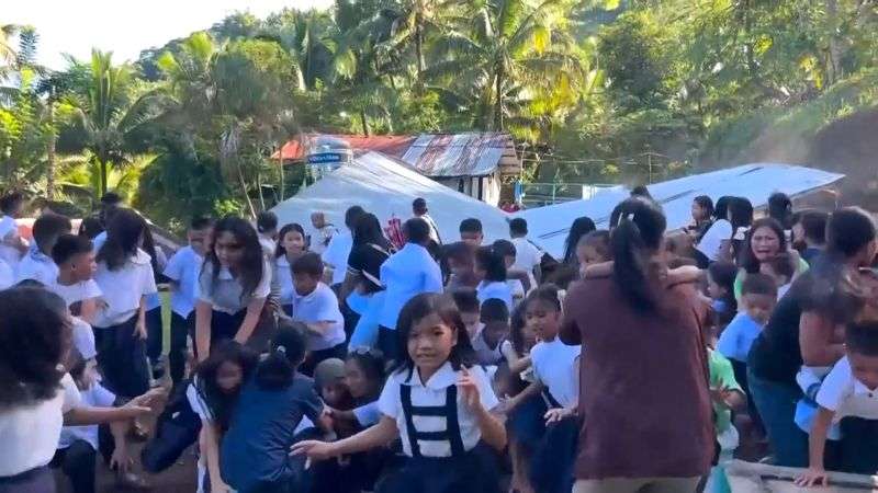 This image made from video provided by DepEd Mahayahay Elementary School shows school children reacting as a canopy roof, rear, collapsed, caused by a powerful earthquake Monday, June 8, 2026, in Malita, Davao Occidental Province, Philippines.