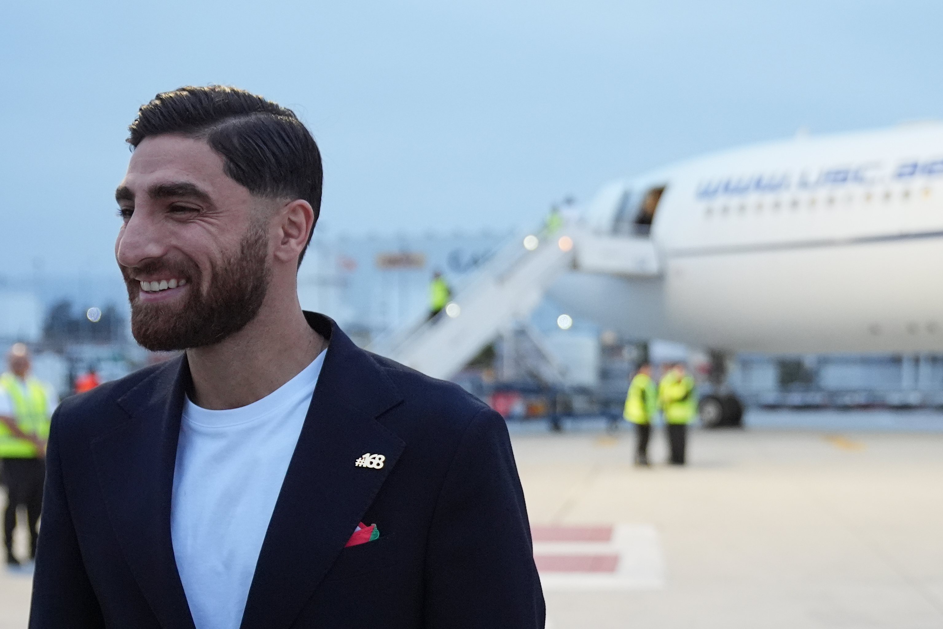 Iran's World Cup players wear pins for victims of deadly strike on school as they arrive in Mexico