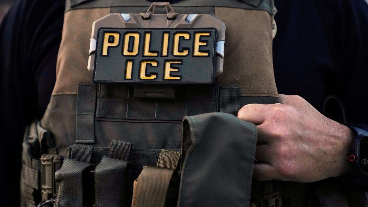 A U.S. Immigration and Customs Enforcement agent is seen in Park Ridge, Ill., Sept. 19, 2025.
