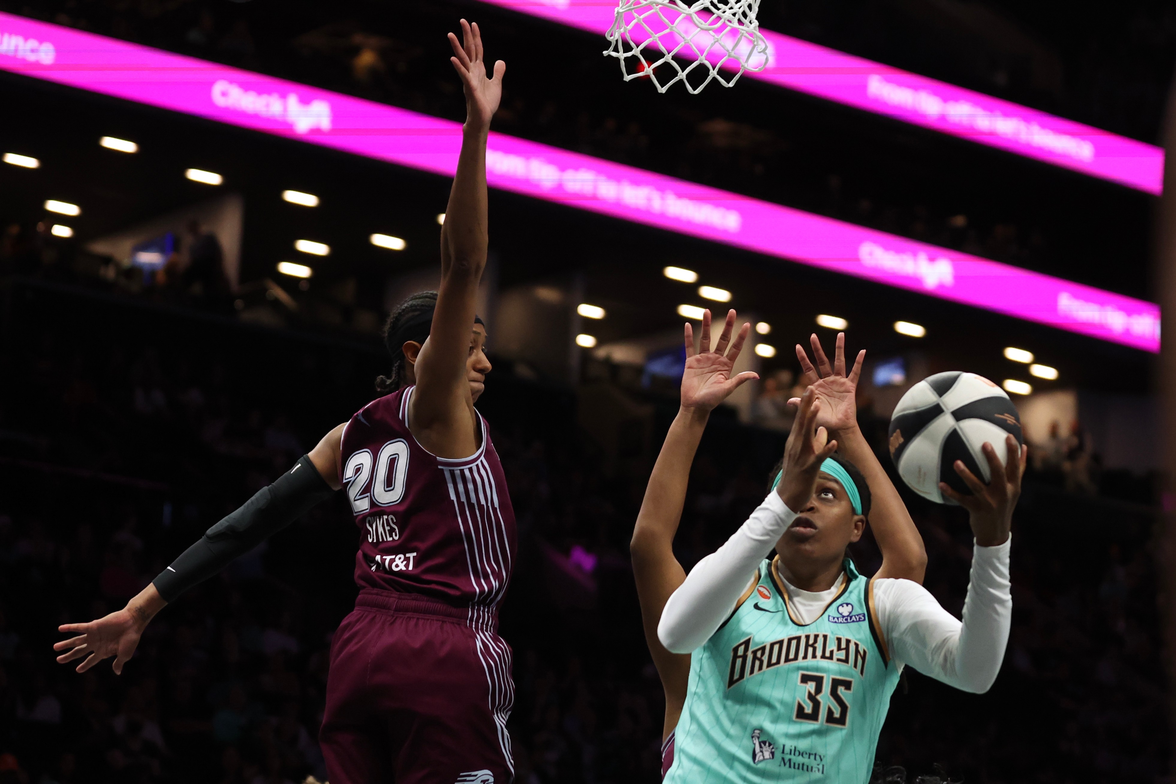 Connecticut retires Jonquel Jones' No. 35 jersey in pregame ceremony; she misses game with illness