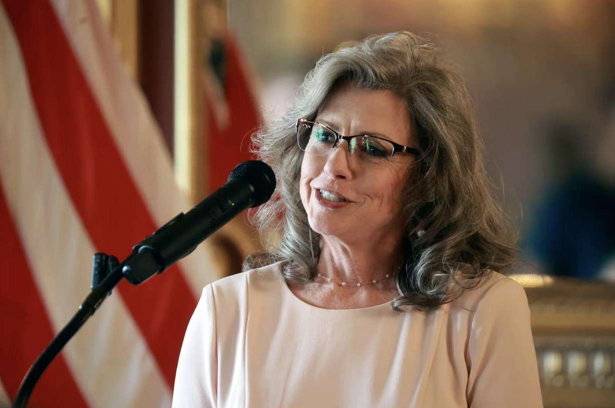 Christina Price, acting Bureau of Land Management Utah state director, speaks before signing a co-management agreement for the 216,995-acre San Rafael Swell Recreation Area at the Capitol in Salt Lake City on Monday.
