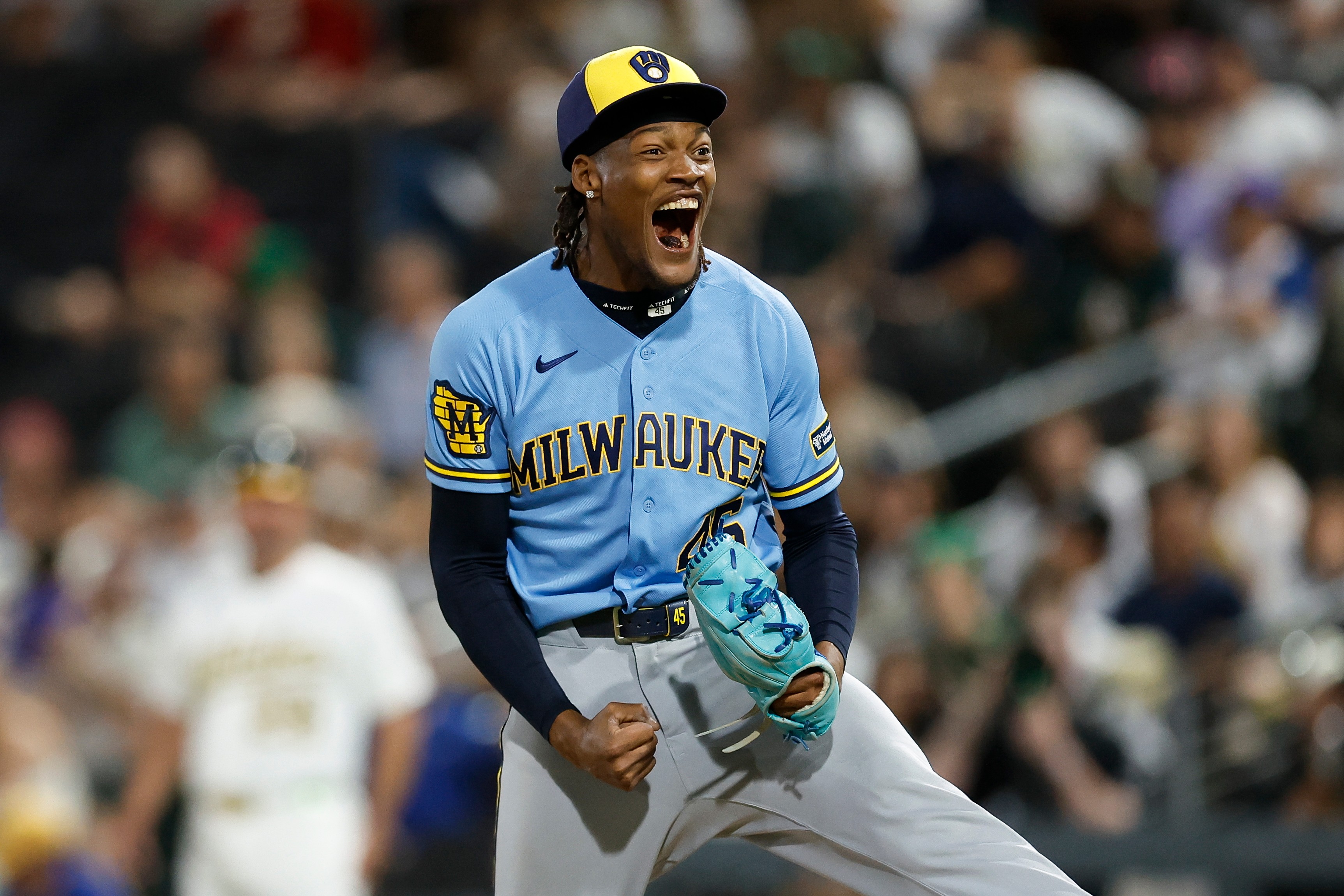 Brewers outlast A's 15-14 in 12 innings as teams combine for 11 homers and 34 hits in Las Vegas