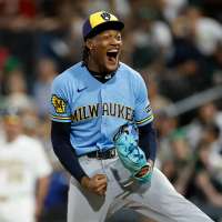 Brewers outlast A's 15-14 in 12 innings as teams combine for 11 homers and 34 hits in Las Vegas