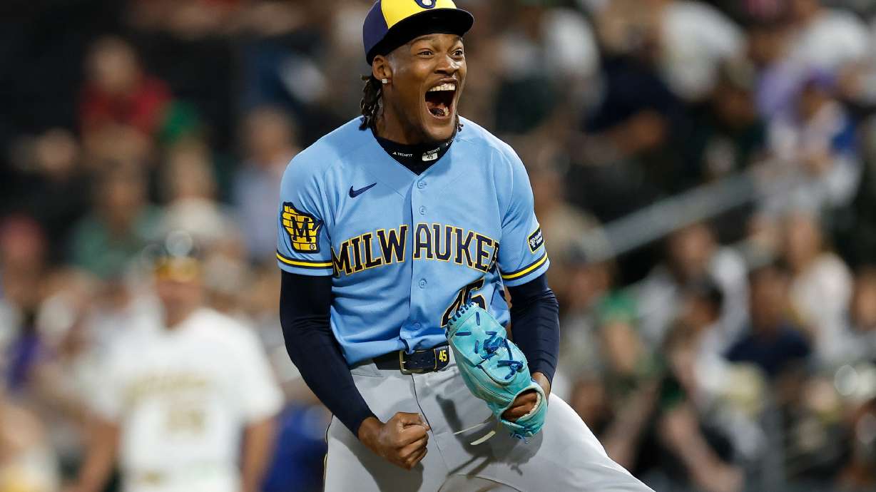Milwaukee Brewers relief pitcher Abner Uribe (45) reacts after striking out the final batter to end the inning during the eleventh inning of a baseball game against the Athletics, Monday, June 8, 2026, in Las Vegas.