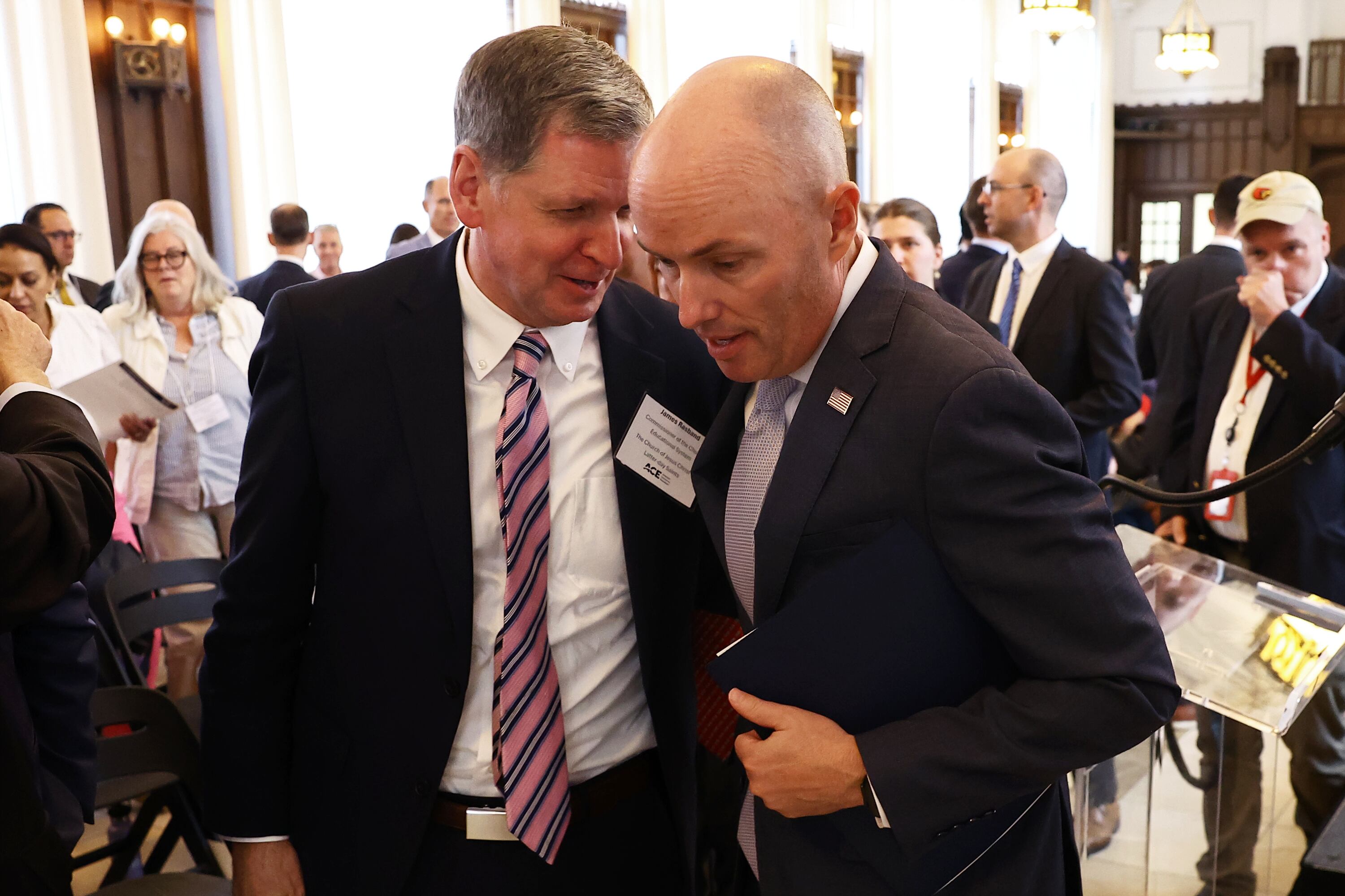 Elder James Rasband, General Authority Seventy of The Church of Jesus Christ of Latter-day Saints and Gov. Spencer Cox following the American Council on Education’s Commission on Faith-Based Colleges and Universities held at Heritage Hall on The Catholic University of America campus on Monday in Washington. Cox lamented on how politics have been brought into religion.