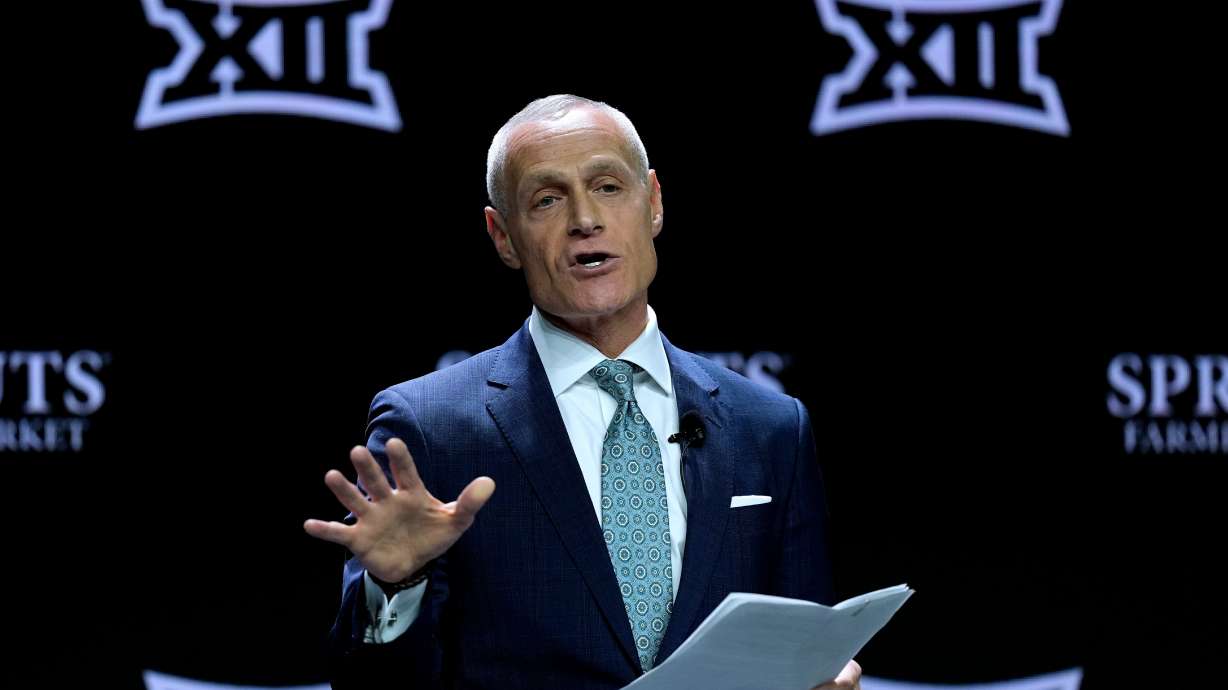 FILE - Big 12 Commissioner Brett Yormark addresses the media during the NCAA college Big 12 women's basketball media day, Oct. 22, 2024, in Kansas City, Mo.