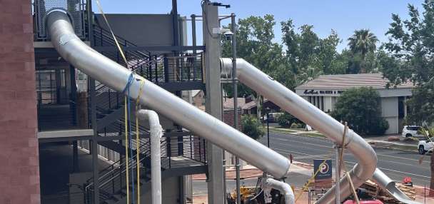 2 massive, stainless-steel slides at City Hall Plaza in St. George aim to bring families downtown