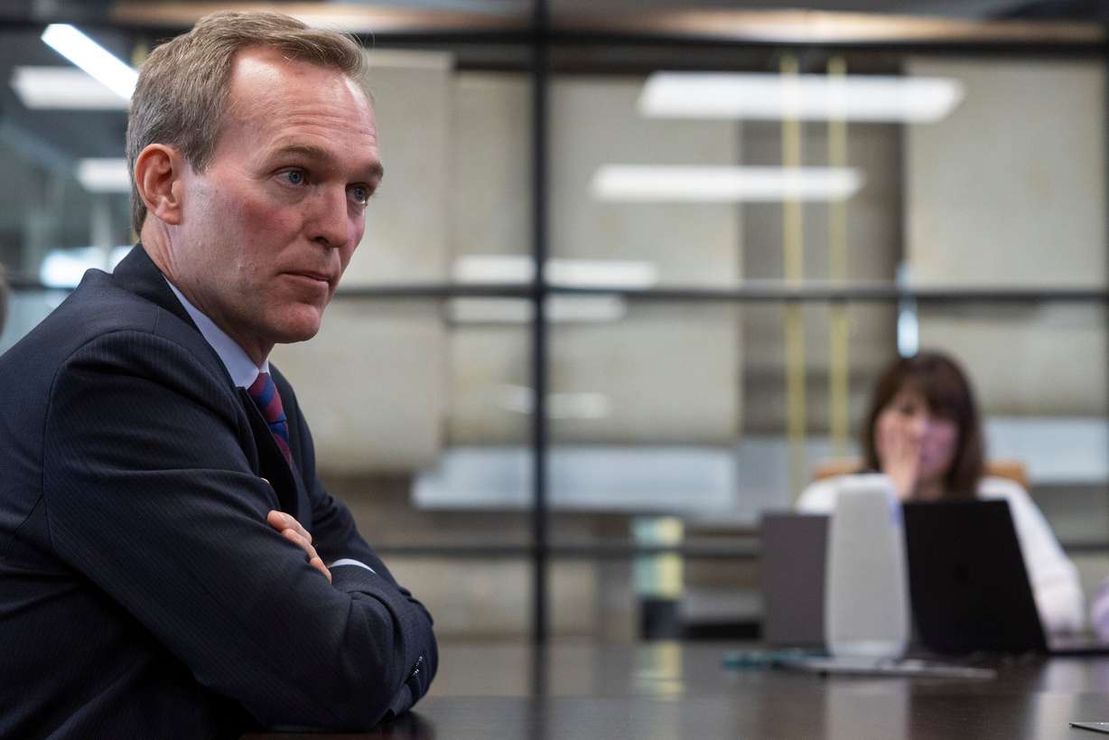 Ben McAdams, a candidate for Utah's 1st Congressional District, speaks with the Deseret News and KSL editorial boards at the Deseret News office in Salt Lake City on Monday. McAdams notably has stock in a data center under construction in Delta.