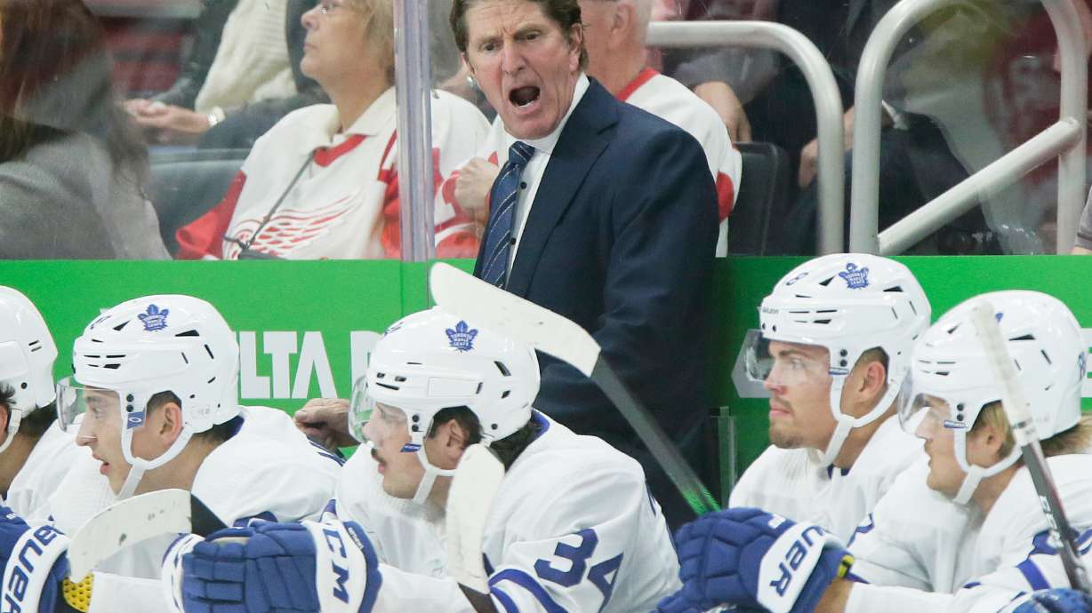 FILE - Toronto Maple Leafs head coach Mike Babcock during the third period of an NHL hockey game against the Detroit Red Wings, Oct. 12, 2019, in Detroit.