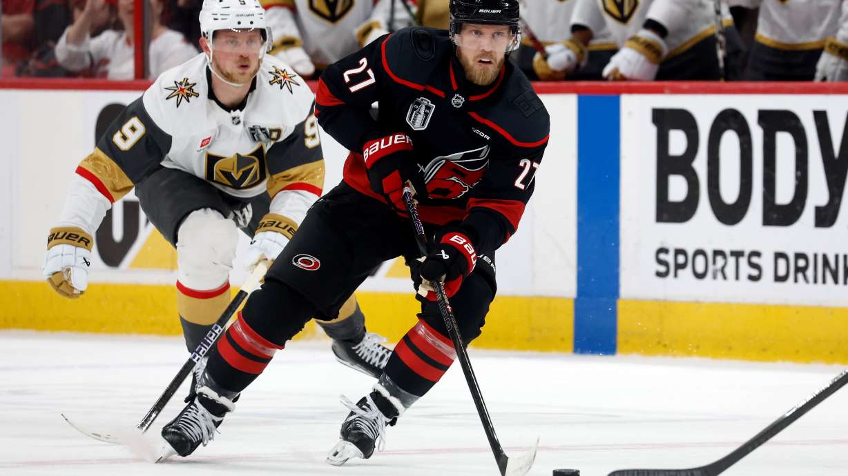 Carolina Hurricanes' Nikolaj Ehlers (27) controls the puck while followed by Vegas Golden Knights' Jack Eichel (9) during the second period in Game 2 of the NHL hockey Stanley Cup Final series in Raleigh, N.C., Thursday, June 4, 2026.