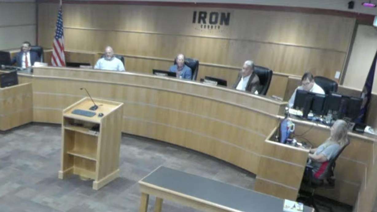Iron County Commissioner Paul Cozzens announced Monday that he is suing Iron County due to a closed session that was held on May 26 from which he and another commission member were excluded.