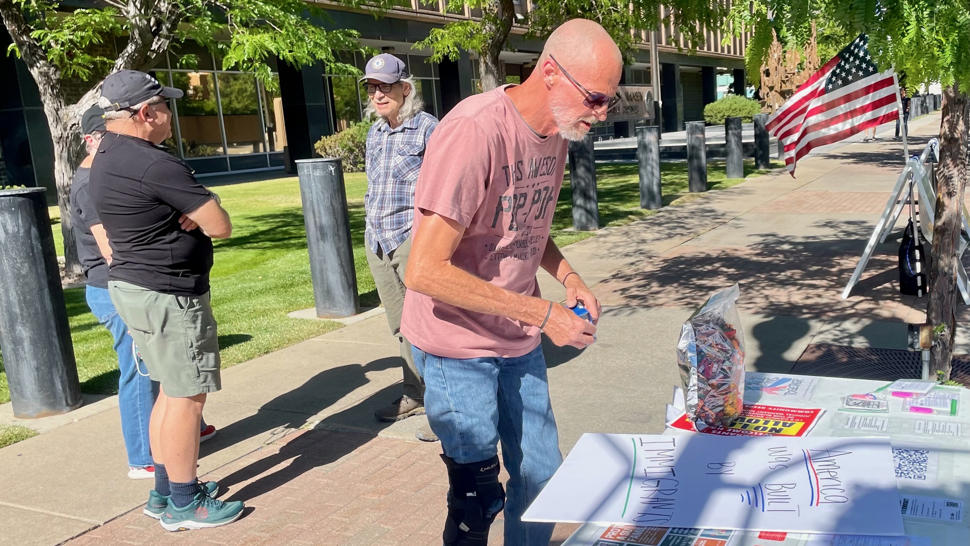 Handful of Utah protesters demonstrate after Trump inks $70B immigration bill