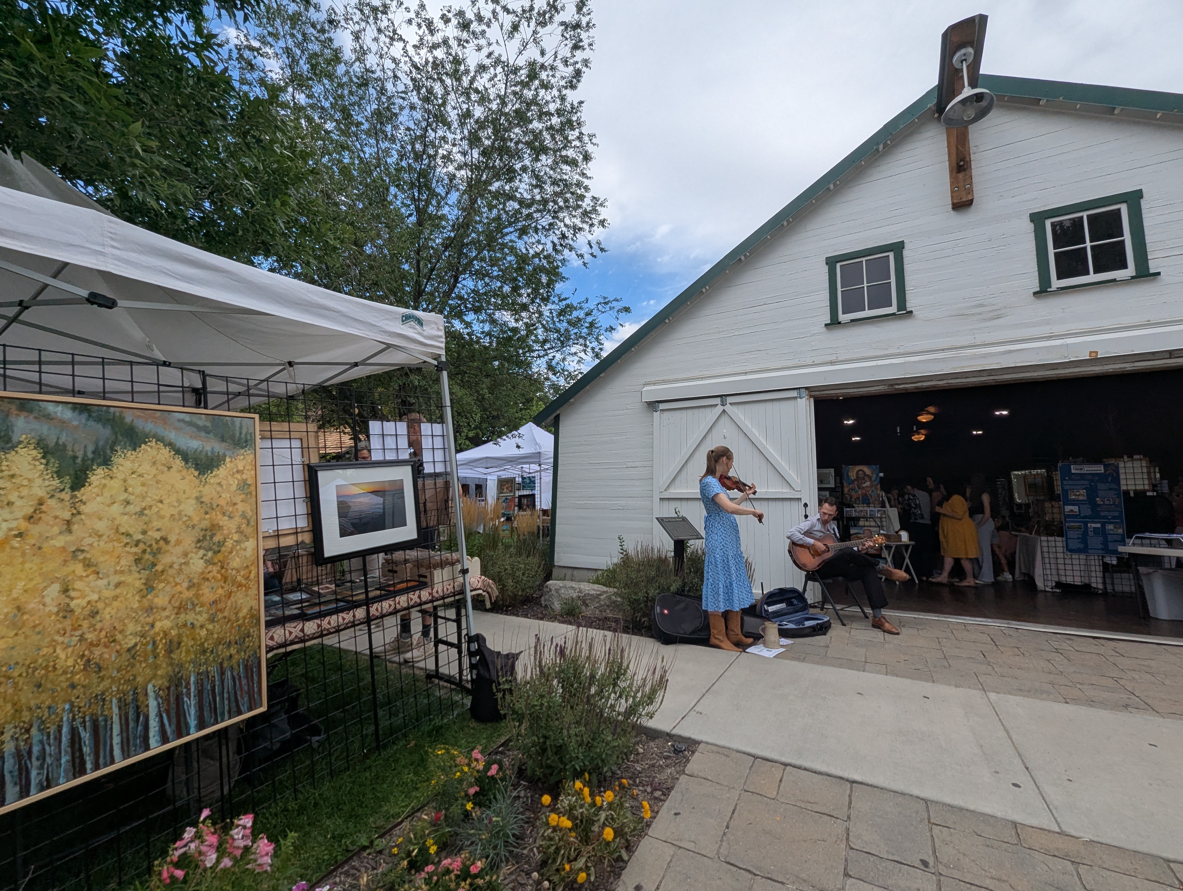 A musician plays an instrument during Draper Visual Arts Foundation's Art in the Barn event in 2025. Artist submissions for the 2026 art show and sale are open through Monday June 15.