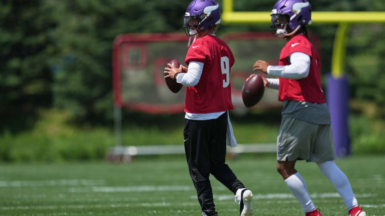 Minnesota Vikings quarterbacks J.J. McCarthy (9) and Kyler Murray (1) take part in drills during an NFL football practice Tuesday, June 9, 2026 in Eagan, Minn.
