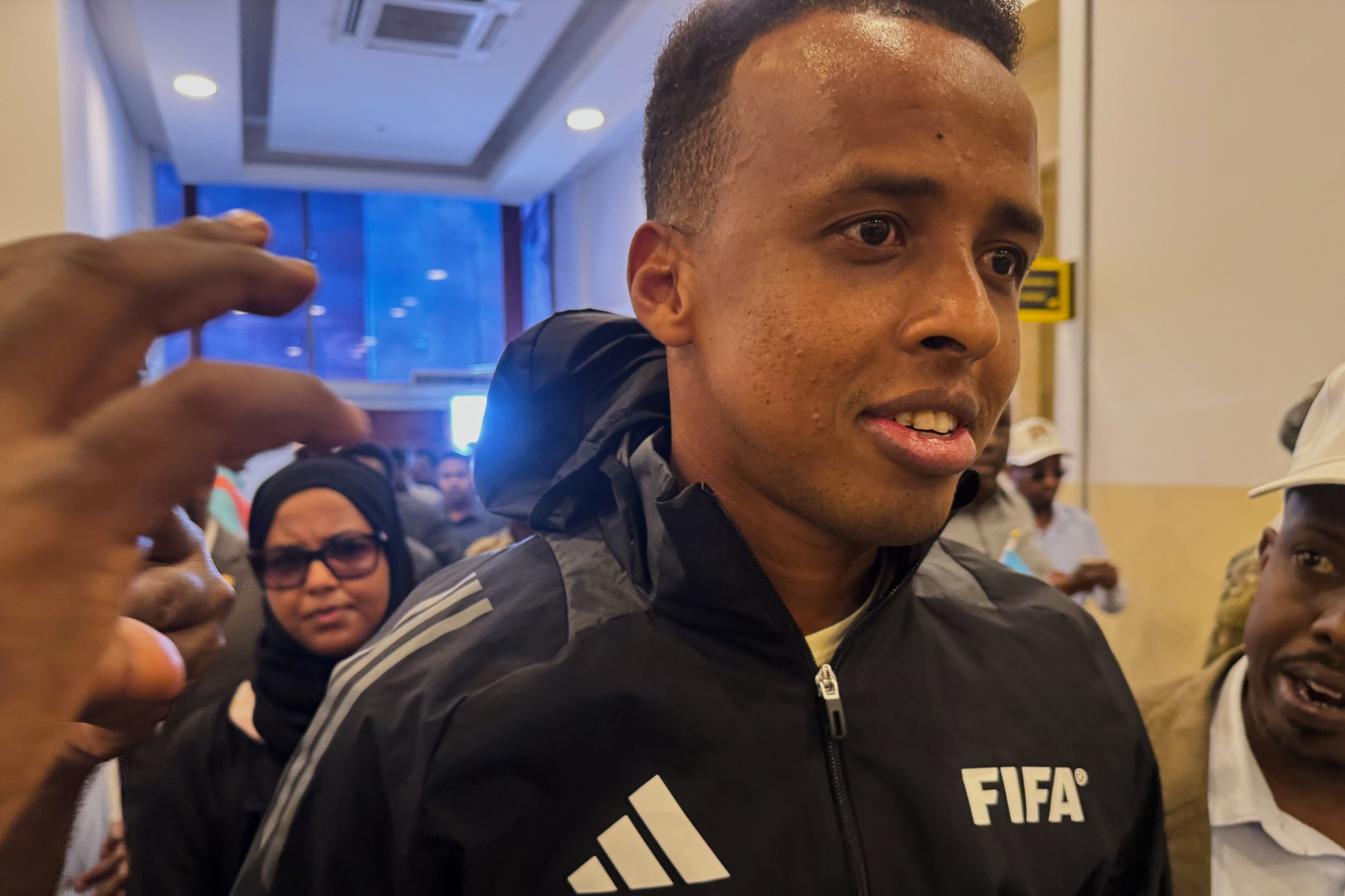 Referee Omar Artan, who was denied entry to the United States, arrives in Mogadishu, Somalia, Wednesday. Olympic officials are confident the same issues won't exist for the 2028 Summer Olympics in Los Angeles.