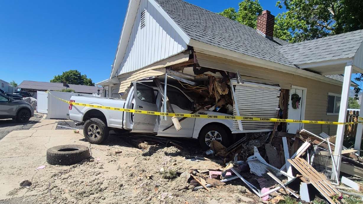 Police in Perry said a driver who was "driving erratically" crashed into a home on Thursday.