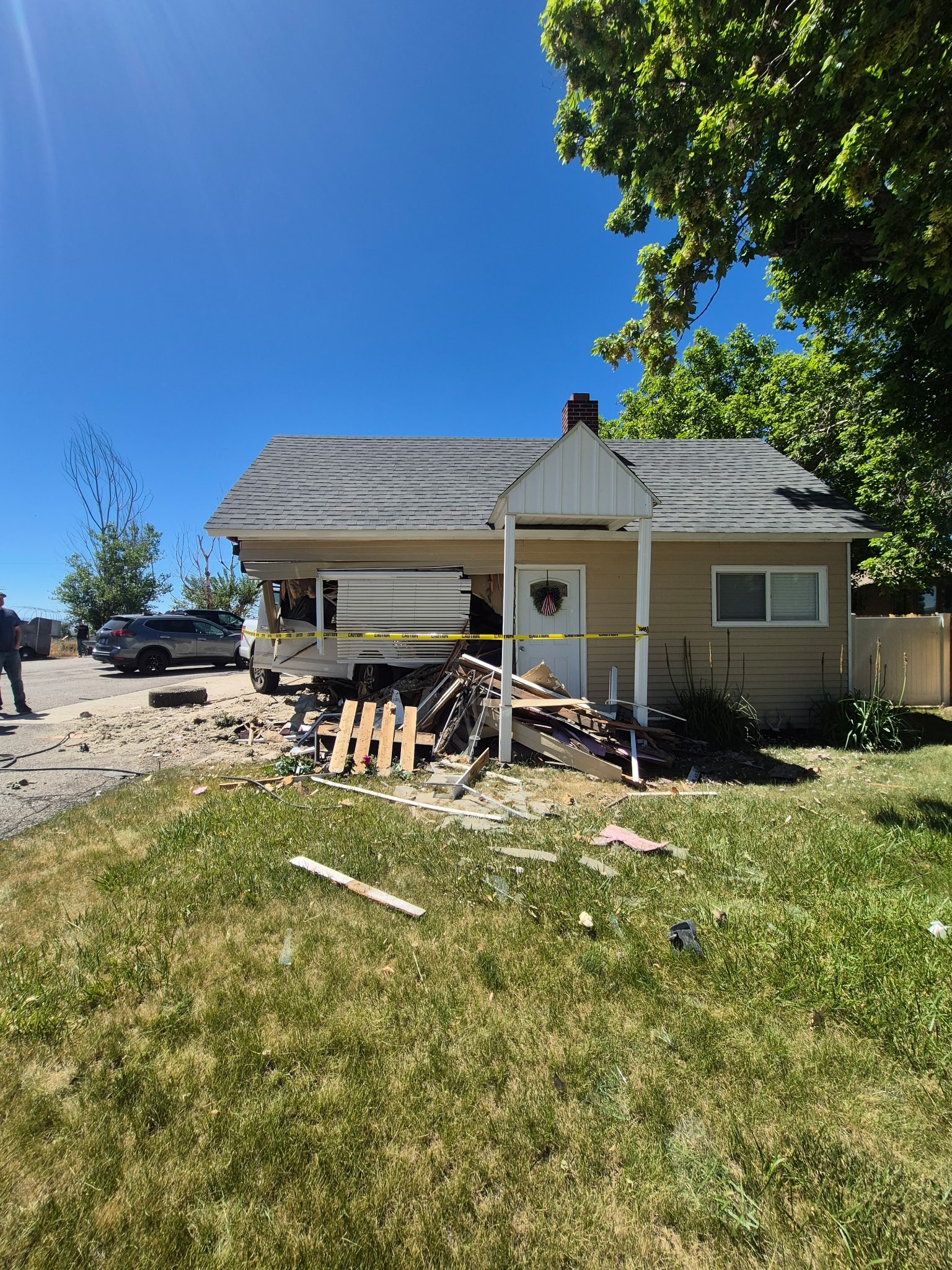 Police in Perry said a car that was reported as "driving erratically" crashed into a home on Thursday.