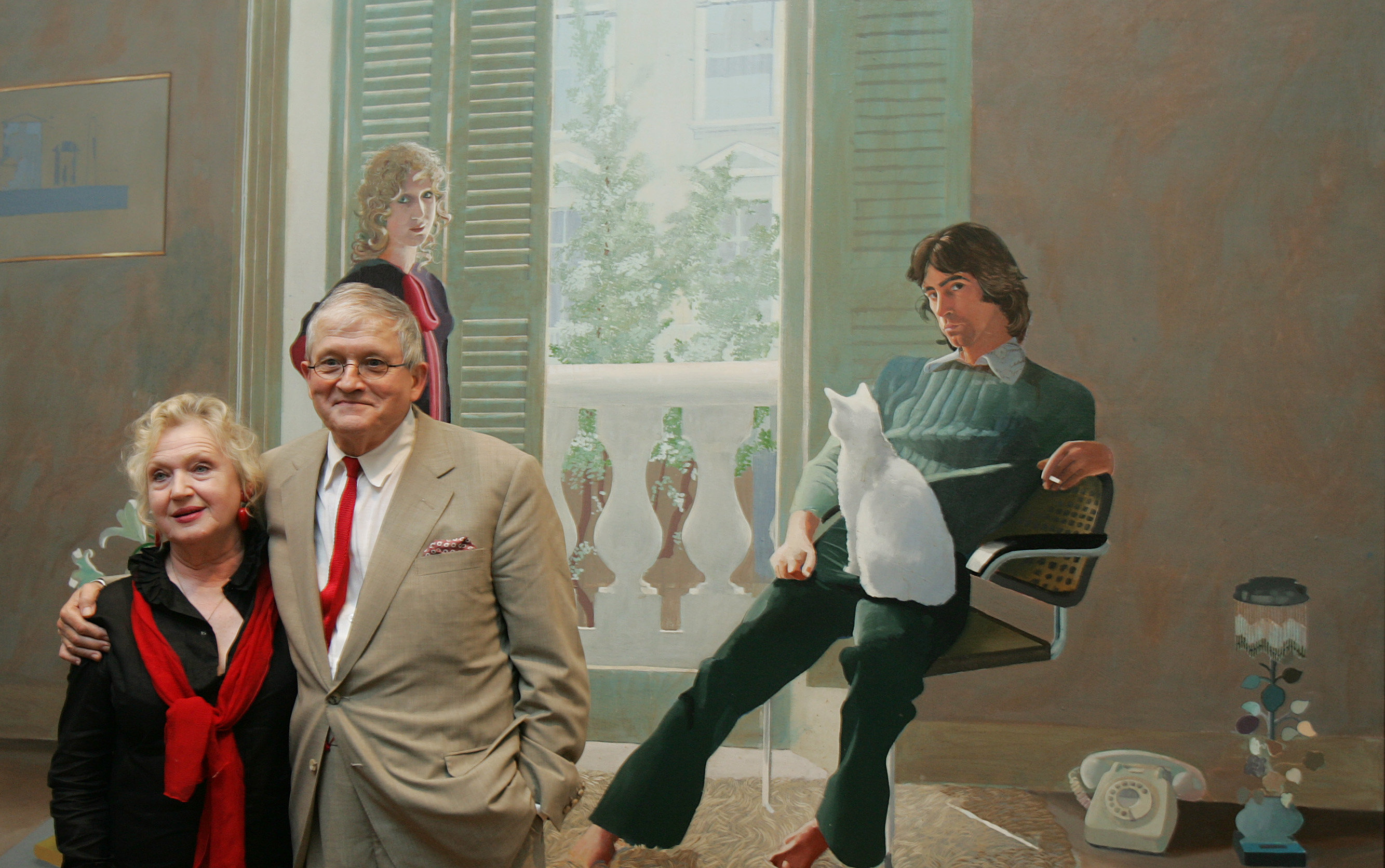 British artist David Hockney stands next to his friend and model Celia Birtwell, in front of one of his most famous works, "Mr. and Mrs. Clark and Percy," at the National Portrait Gallery in London, Oct. 11, 2006. The painting was voted as Britain's best in a 2005 BBC poll.