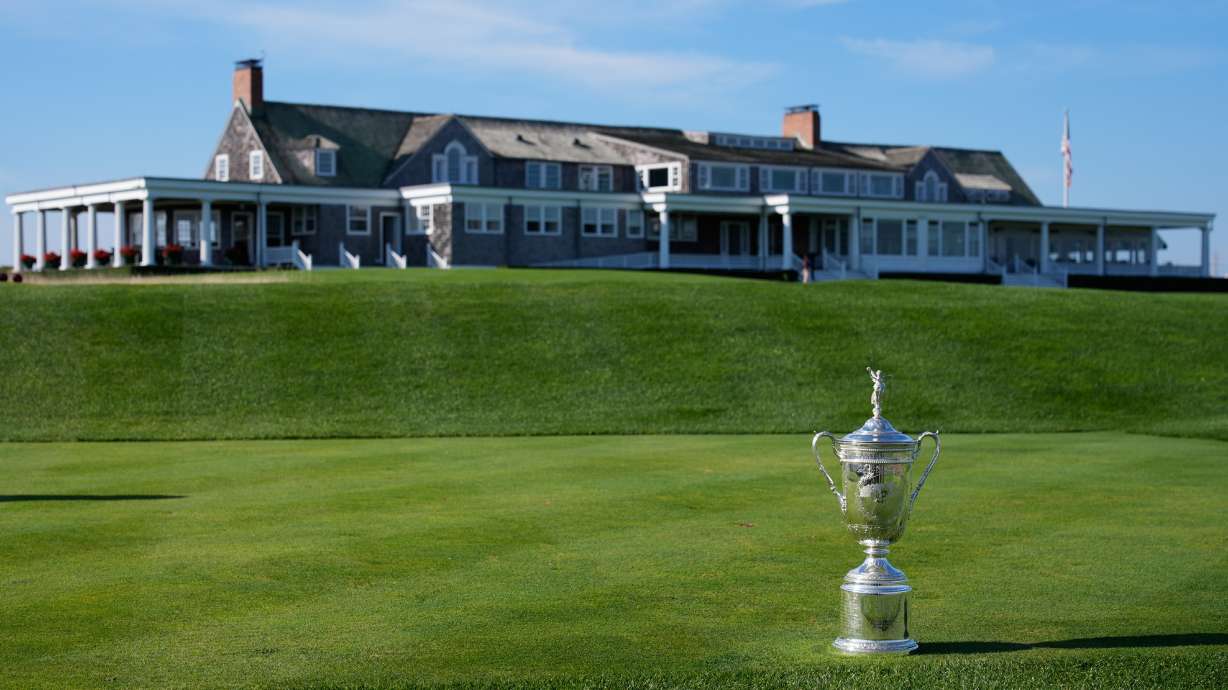 FILE - The U.S. Open Golf Championship trophy is displayed in front of the clubhouse at Shinnecock Hills Golf Club in Southampton, N.Y., Sept. 15, 2025.