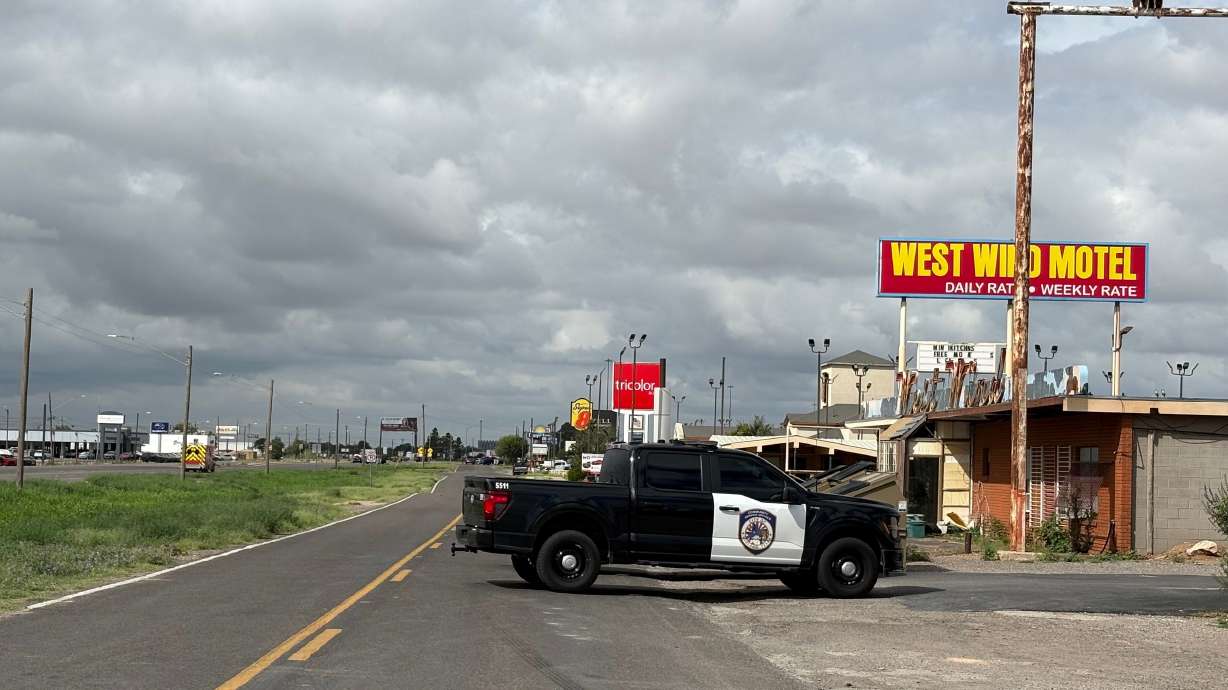 Law enforcement responds to an active shooting scene Friday in Midland, Texas.