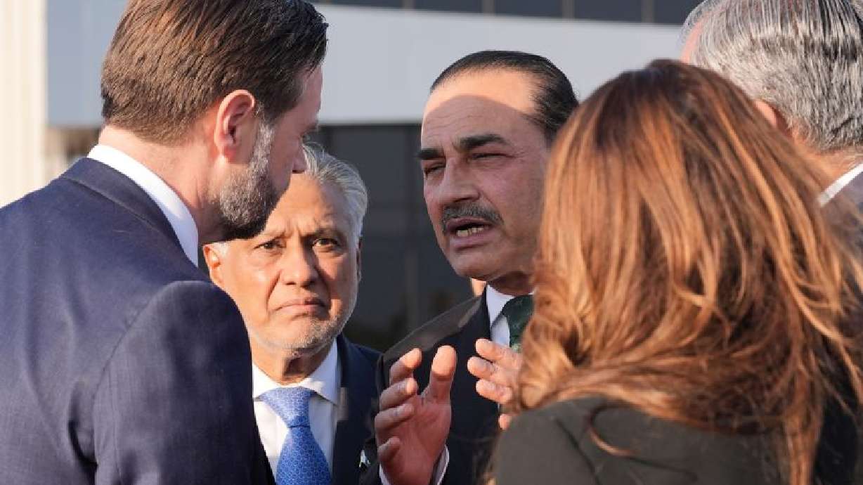 Vice President JD Vance, left, talks to Pakistan's Chief of Defense Forces and Chief of Army Staff Field Marshall Asim Munir, right, and Pakistani Deputy Prime Minister and Foreign Minister Mohammad Ishaq Dar, center, before boarding Air Force Two after attending talks on Iran in Islamabad, Pakistan, April 12.