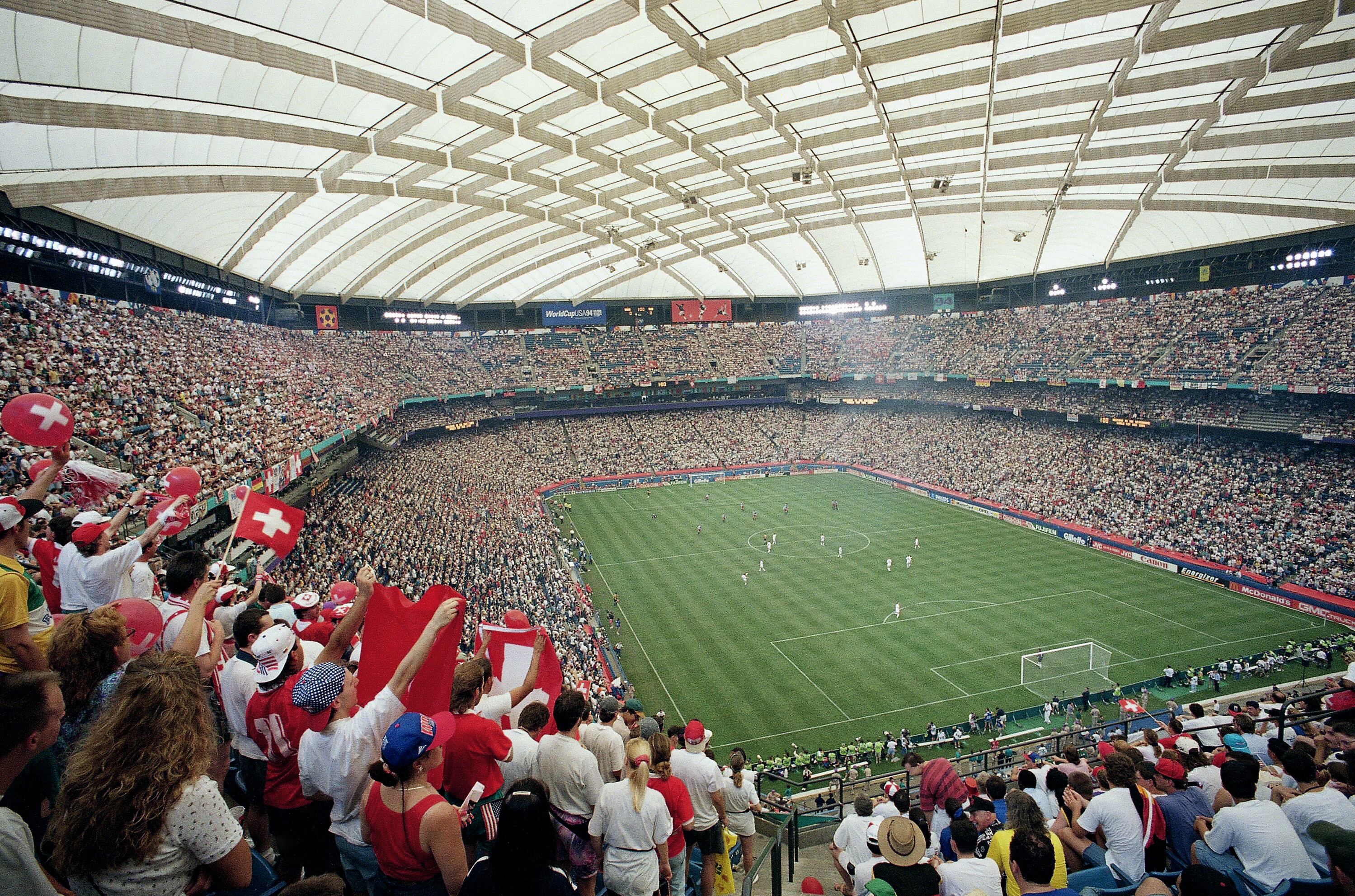 The crowd cheers as the United States plays Switzerland, the first World Cup soccer game ever played indoors, during a Group A World Cup soccer match, Saturday, June 18, 1994, at the Silverdome in Pontiac, Mich.