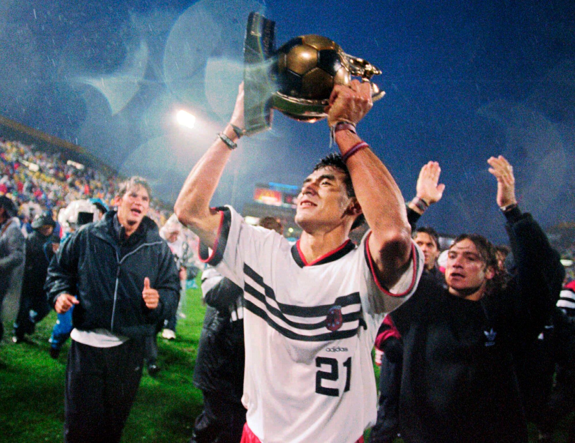 On Oct. 20, 1996, DC United's Raul Diaz Arci holds the MLS Championship Trophy aloft after defeating the Los Angeles Galaxy at Foxboro Stadium in Foxborough, Mass. The squad captured three of the first four MLS Cups, 1996, ’97 and ’98.