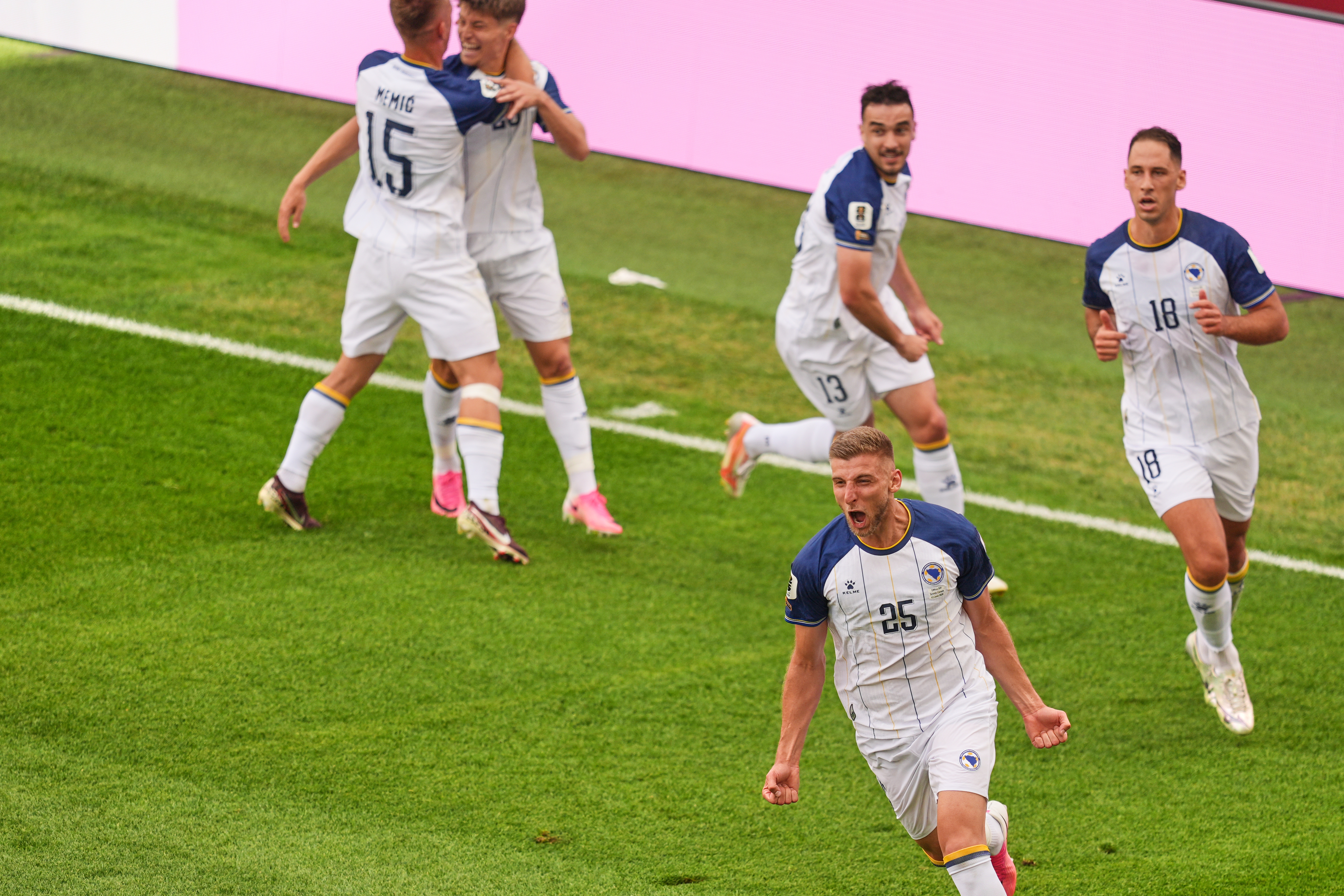 Bosnia's Jovo Lukic (25) celebrates after scoring the opening goal during the World Cup Group B soccer match between Canada and Bosnia in Toronto, Friday, June 12, 2026.