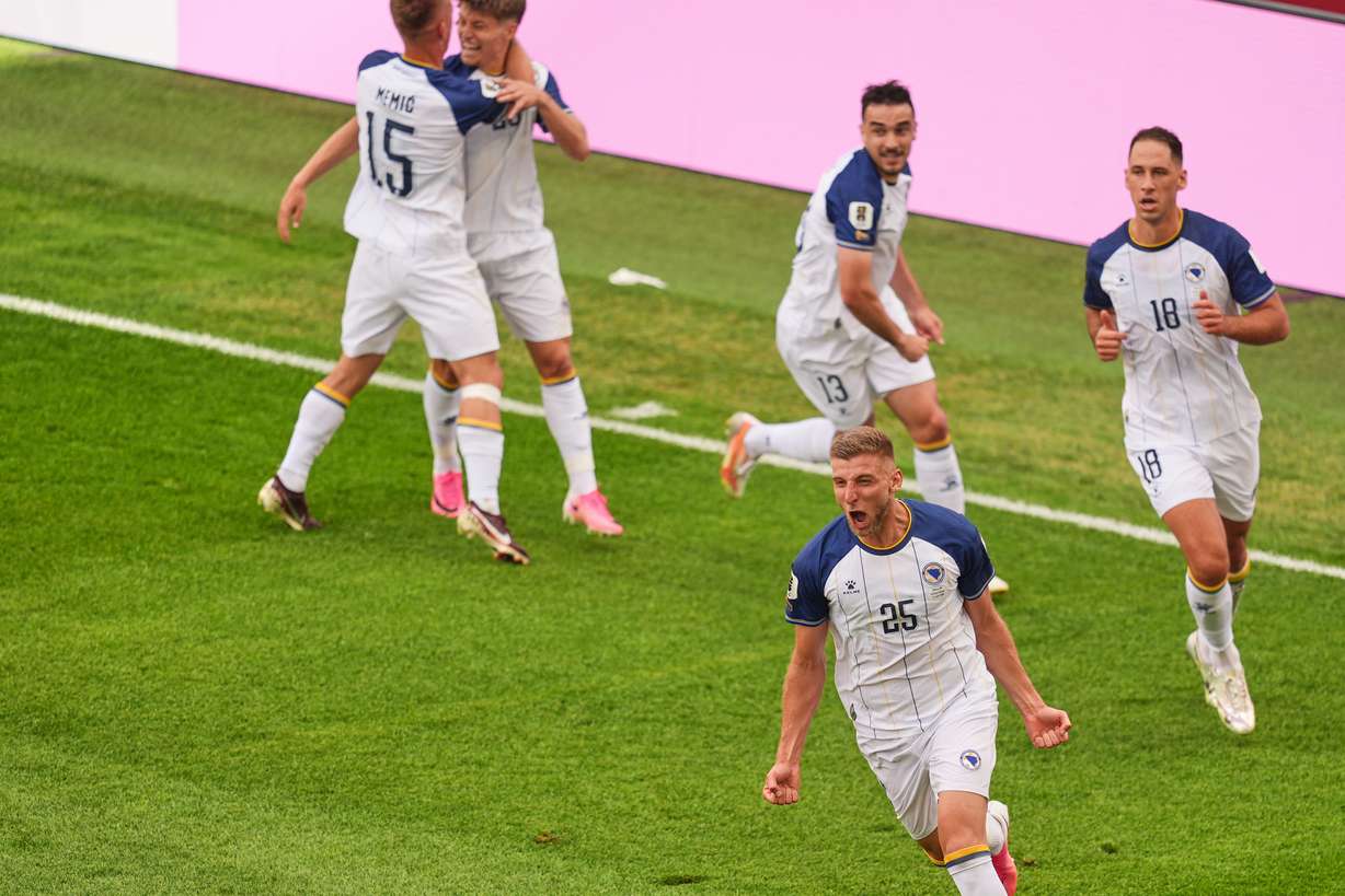 Bosnia's Jovo Lukic (25) celebrates after scoring the opening goal during the World Cup Group B soccer match between Canada and Bosnia in Toronto, Friday, June 12, 2026.