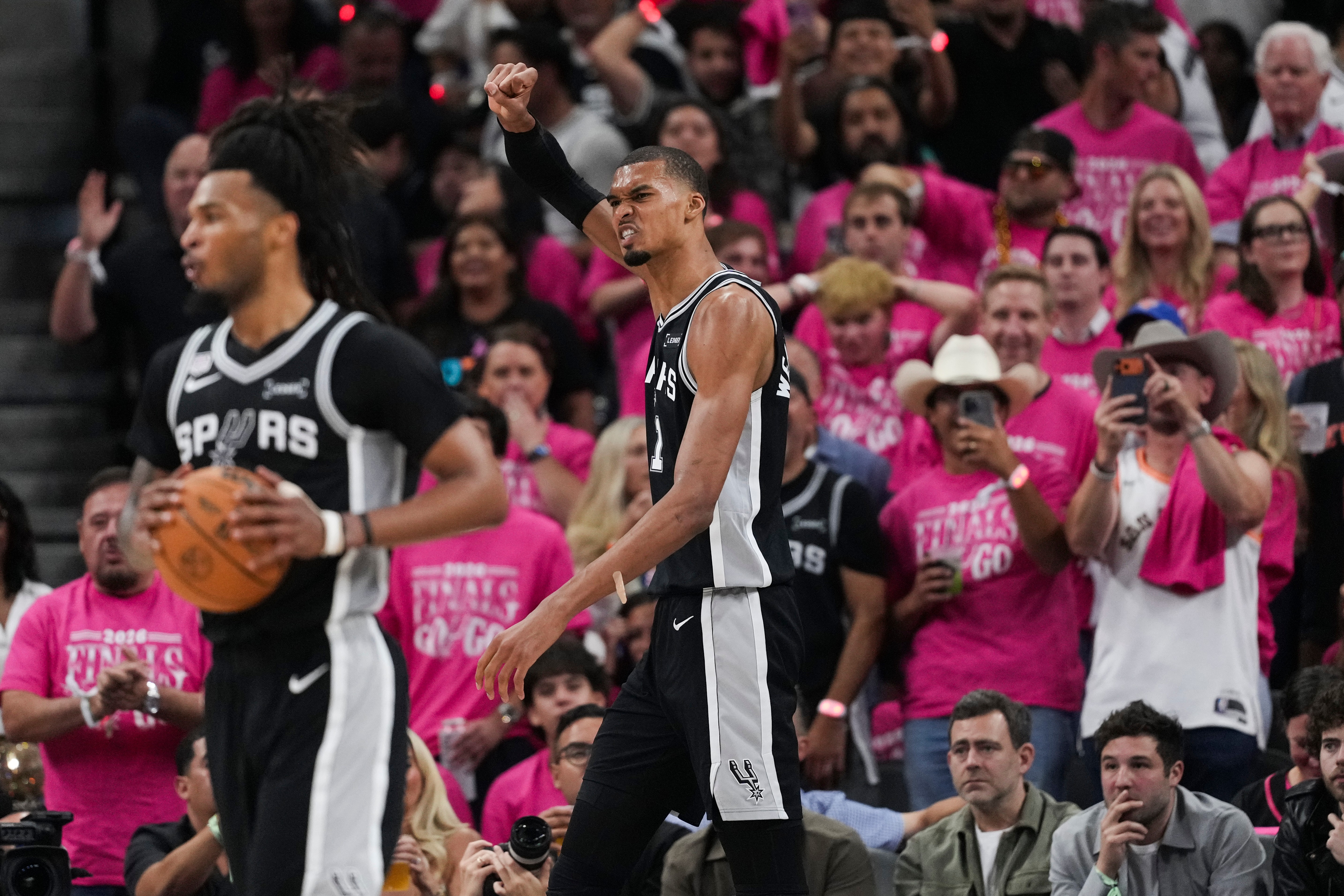 San Antonio Spurs forward Victor Wembanyama (1) celebrates a basket against the New York Knicks during the second half of Game 1 of the NBA Finals basketball series, Wednesday, June 3, 2026, in San Antonio.