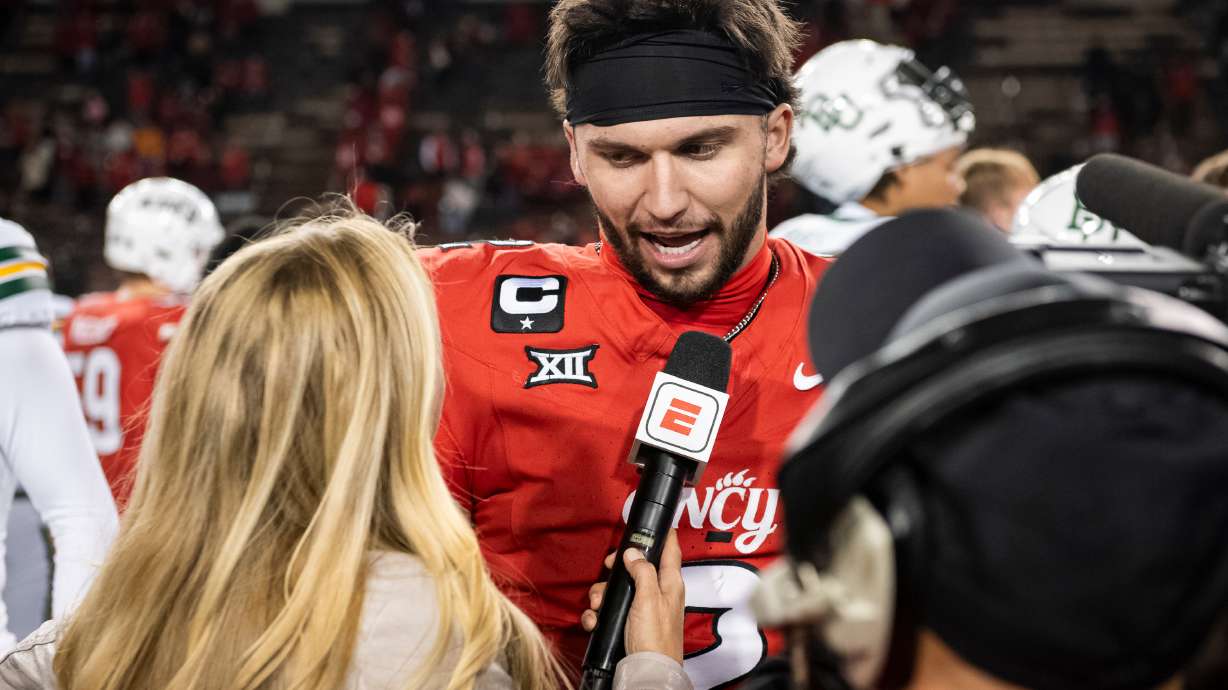 FILE - Cincinnati quarterback Brendan Sorsby (2) is interviewed after a NCAA college football game against Baylor, Oct. 25, 2025, in Cincinnati.