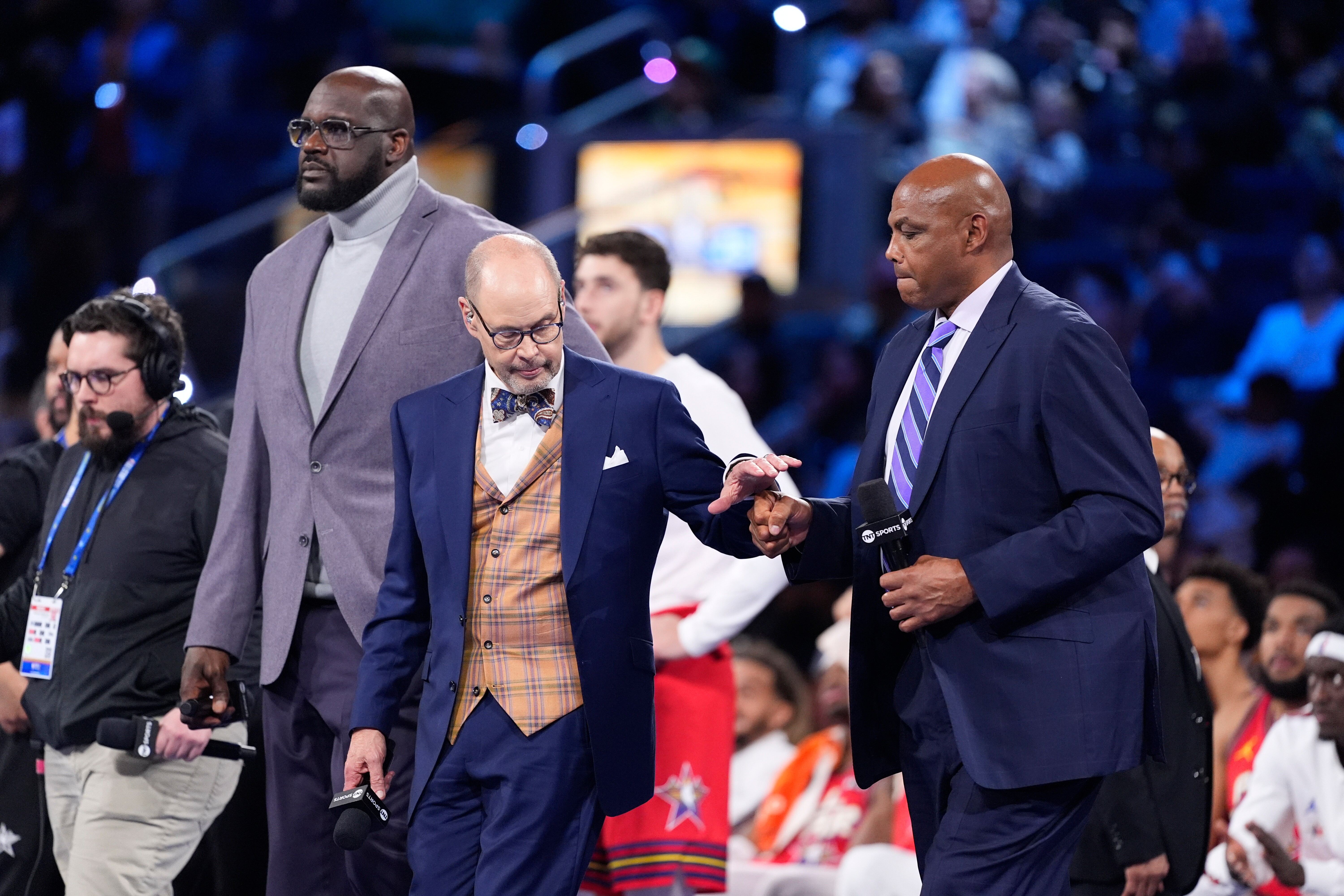 FILE - Shaquille O'Neal, Ernie Johnson and Charles Barkley stand at mid-court to be honored during the NBA All-Star basketball game Sunday, Feb. 16, 2025, in San Francisco. 