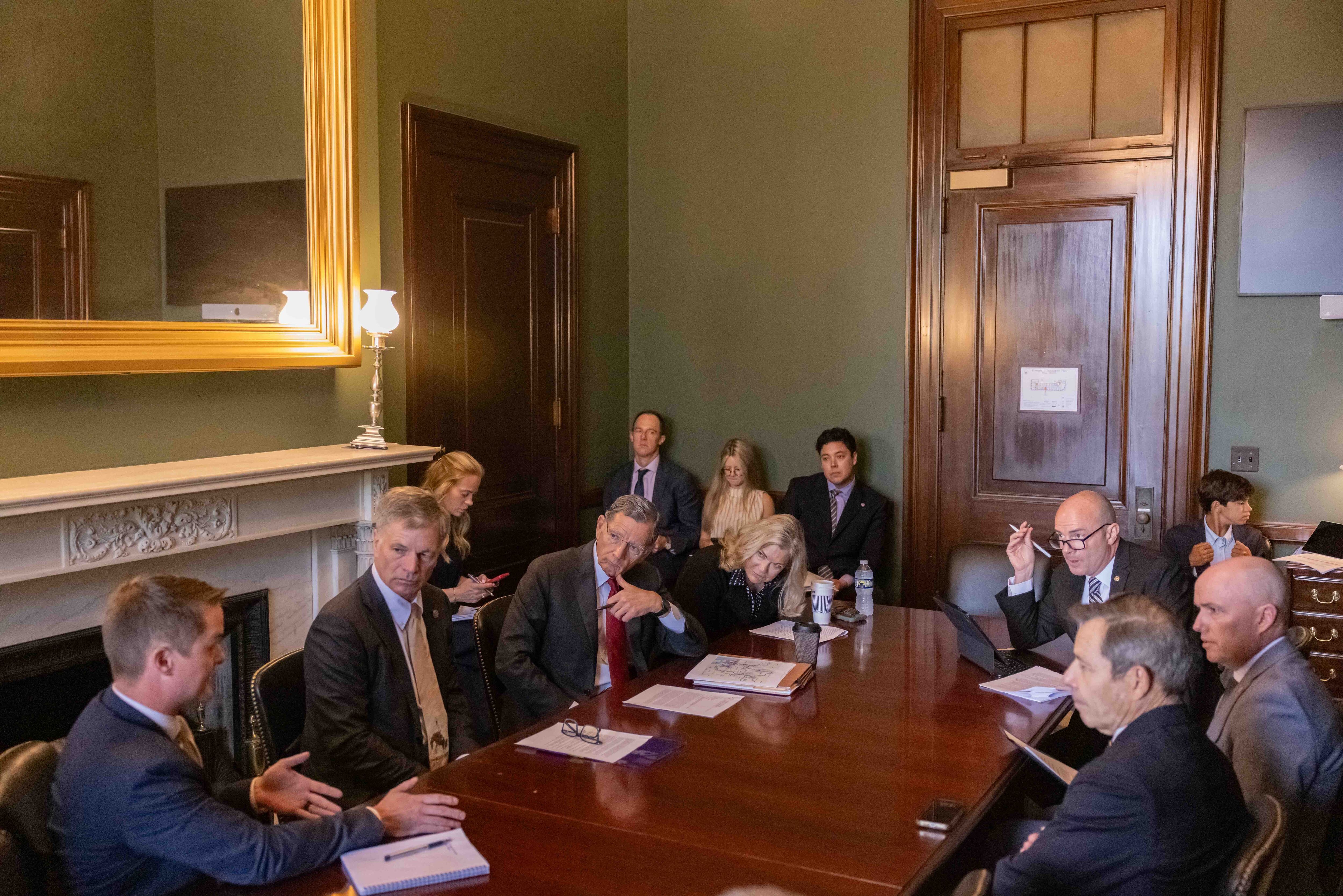 A meeting is held in the office of Sen. Mike Lee, with Utah Gov. Spencer Cox, Sen. John Curtis and others, including Sen. Cynthia Lummis, R-Wyo., Sen. John Barrasso, R-Wyo., Wyoming Gov. Mark Gordon and others at the Russell Senate Office Building in Washington, on Wednesday. Both political delegations are pushing for a deal on the Colorado River.