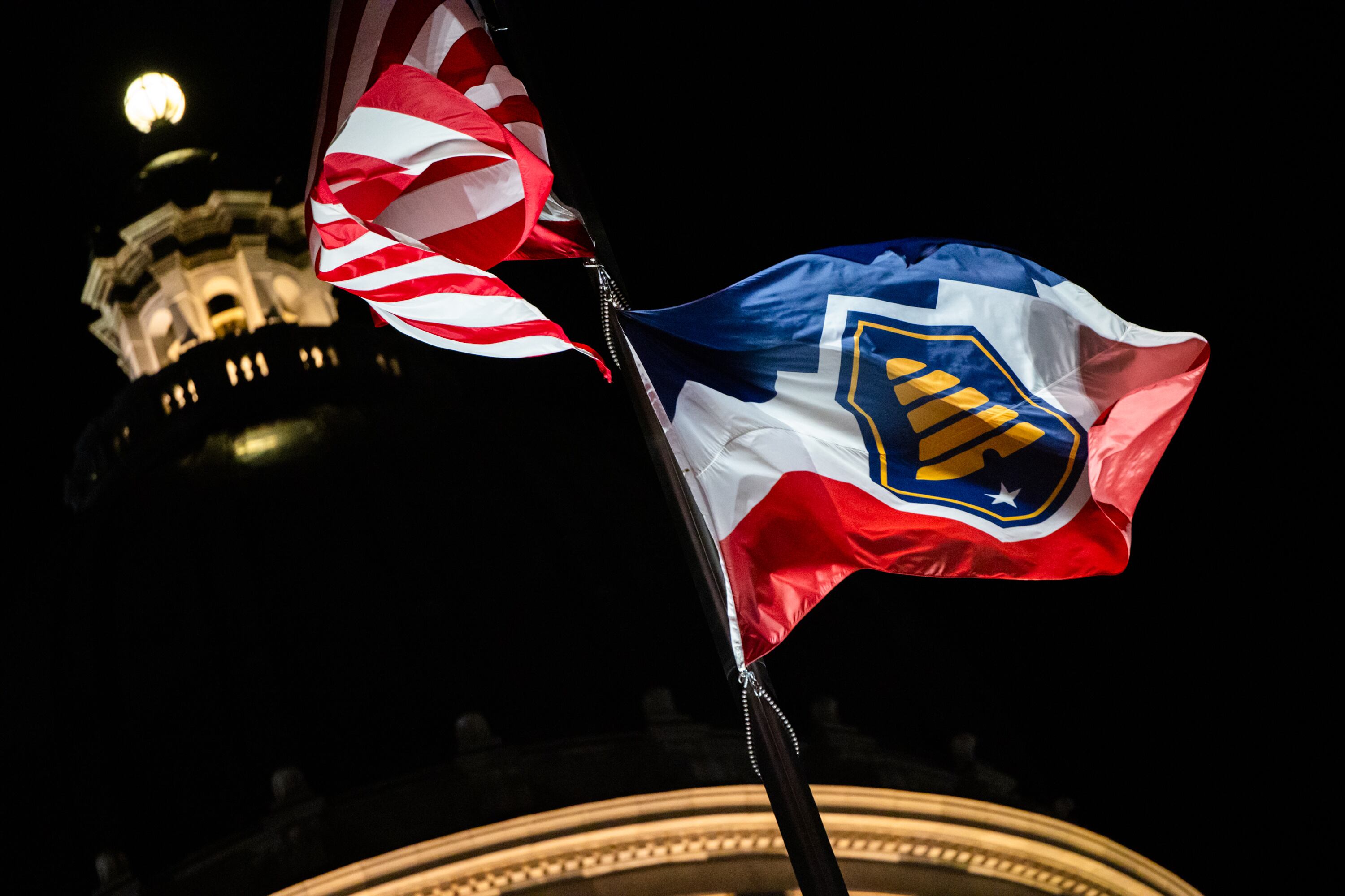The American flag and Utah’s state flag during the last day of the legislative session outside the Capitol in Salt Lake City on March 6. Gov. Spencer Cox said Utah is committed to a deal that protects the Colorado River long-term.
