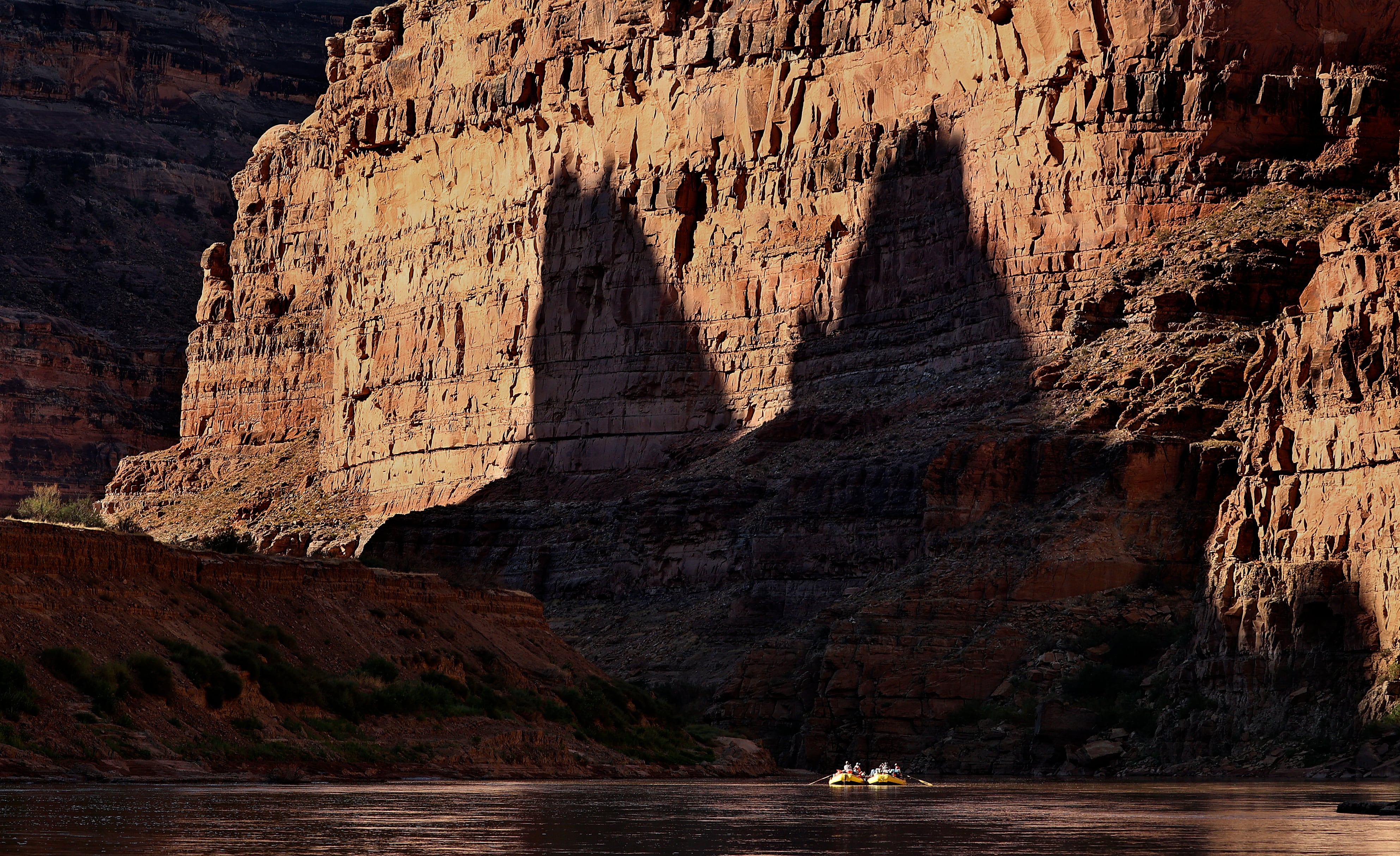 A group of river experts, scientists, water rights lawyers, tribal representatives, nonprofit representatives, philanthropists and river guides raft down Cataract Canyon on the Colorado River with the Returning Rapids Project on Sept. 22, 2024. Utah and Wyoming are pushing other Colorado River basin states to forge a new deal.
