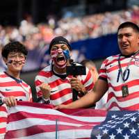 Roaring crowds in stars and stripes show up for the US team, and soccer's moment in their country