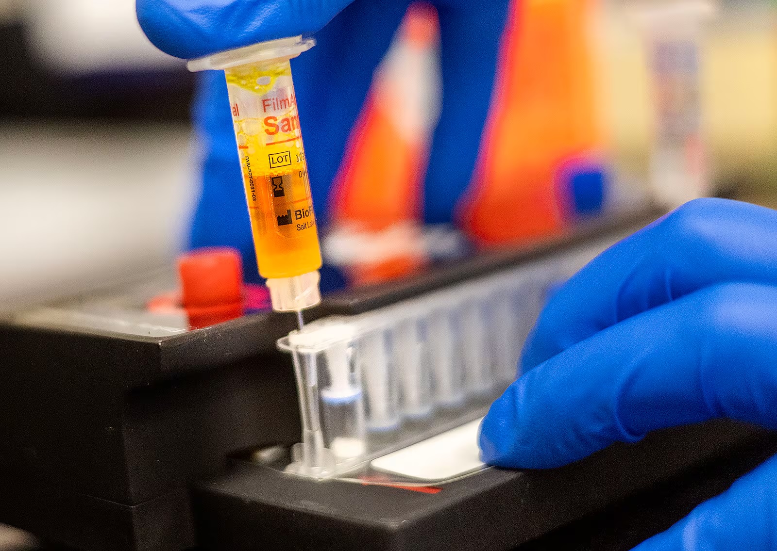 A BioFire Global Fever Special Pathogens panel test is demonstrated at BioFire Defense in Murray on Thursday.