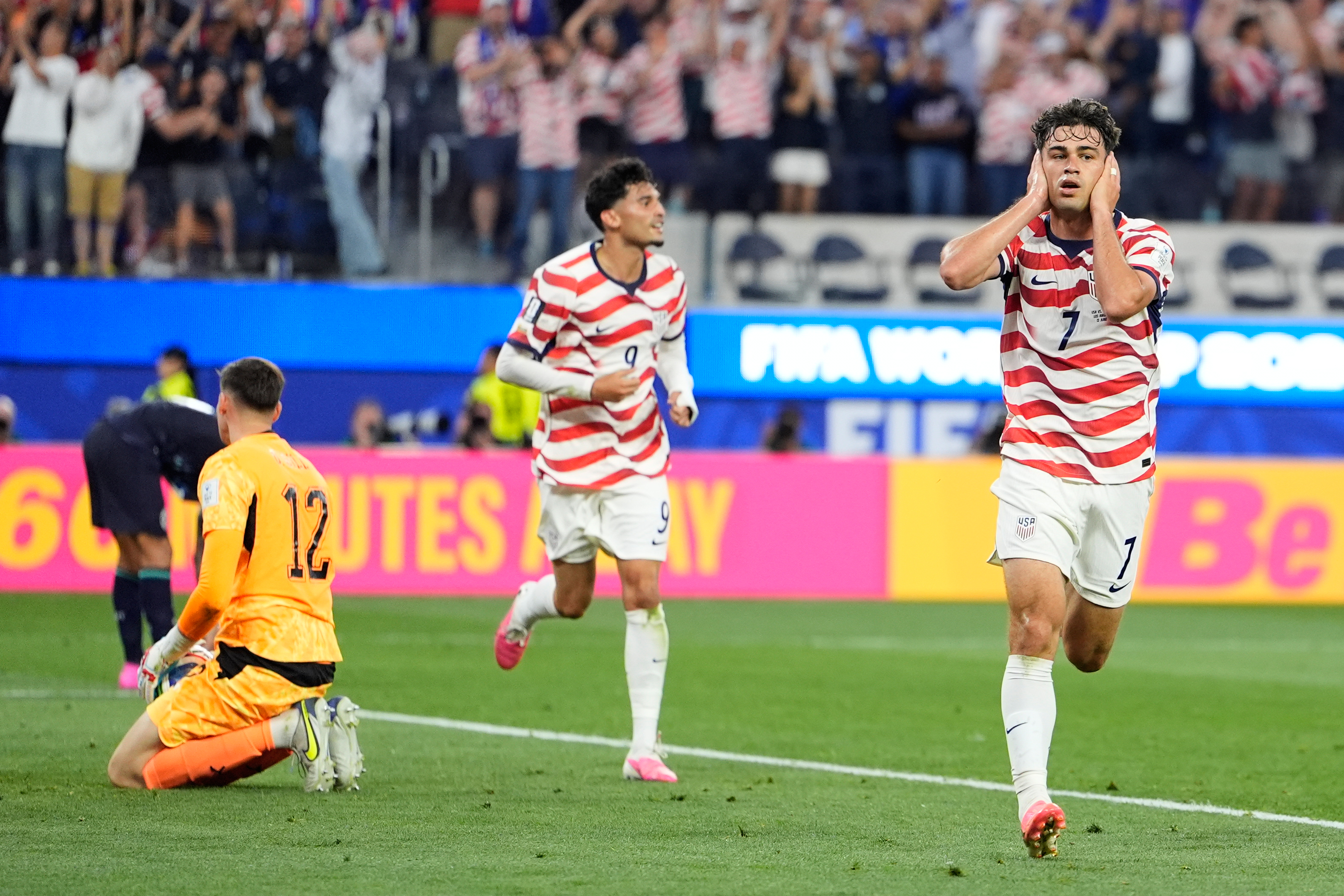United States' Giovanni Reyna, right, reacts after scoring his team's fourth goal during the World Cup Group D soccer match between the United States and Paraguay in Inglewood, Calif., near Los Angeles, Friday, June 12, 2026.